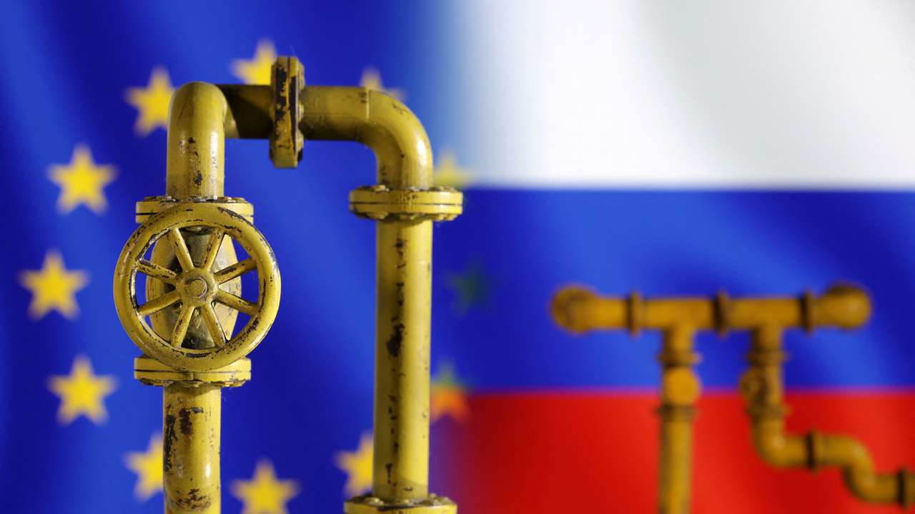 Illustration shows natural gas pipeline, EU and Russia flags