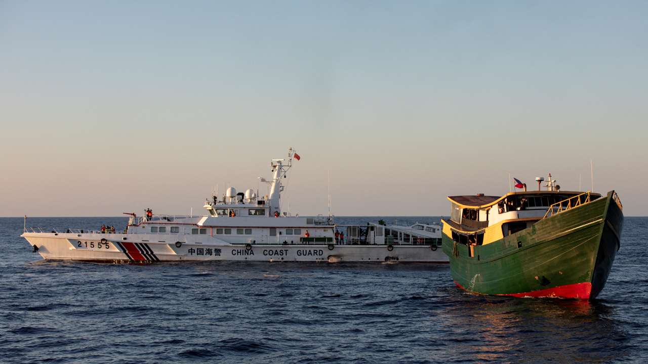 A Chinese Coast Guard vessel blocks the Philippine resupply vessel Unaizah May 4, on its way to a resupply mission at Second Thomas Shoal in the South China Sea