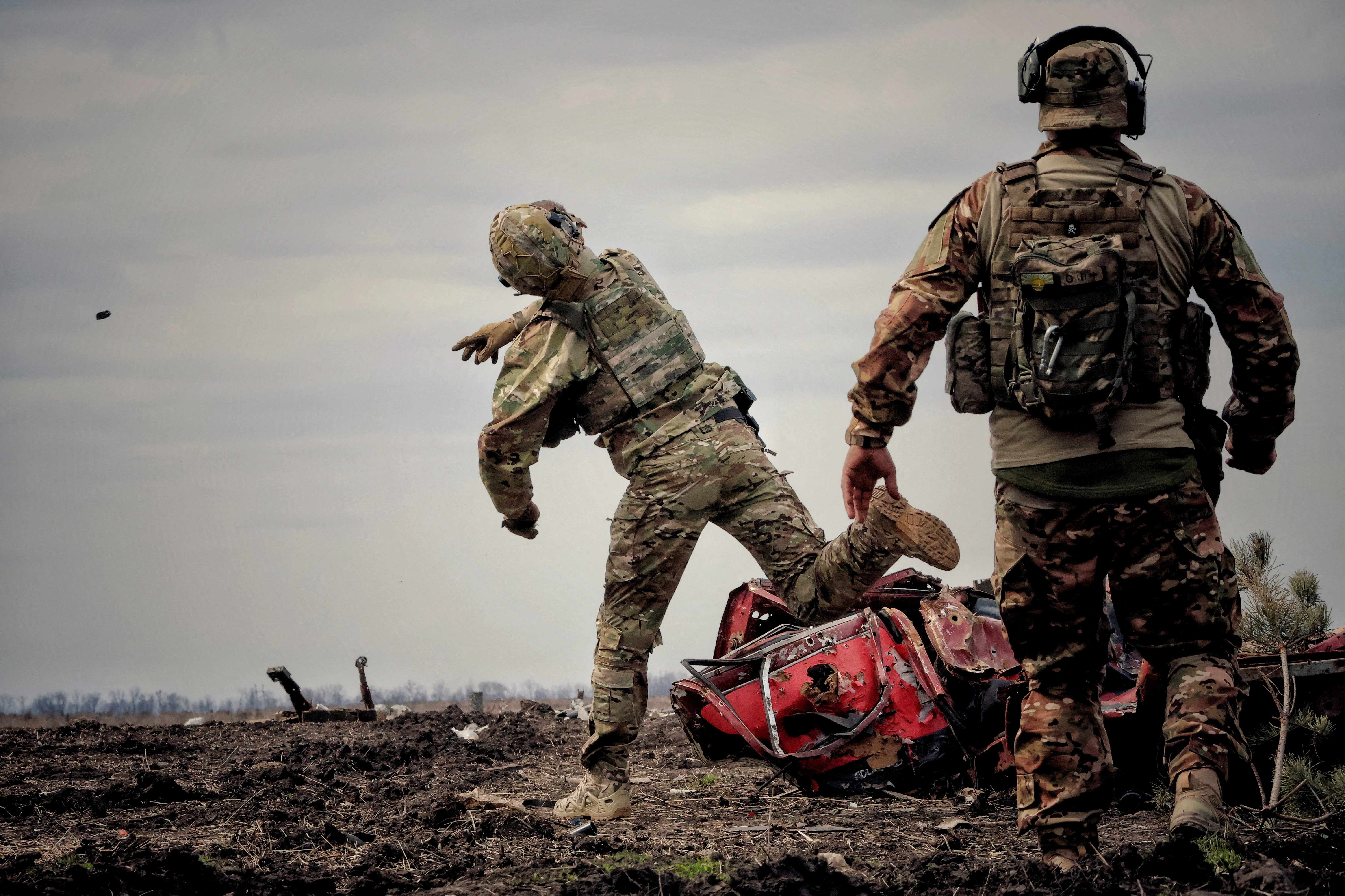 FILE PHOTO: Ukrainian serviceman throws a grenade during a training in Donbas region
