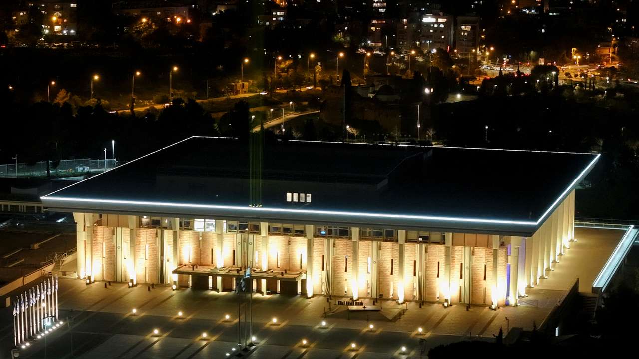 Israel's parliament lit in yellow to support the hostages, in Jerusalem