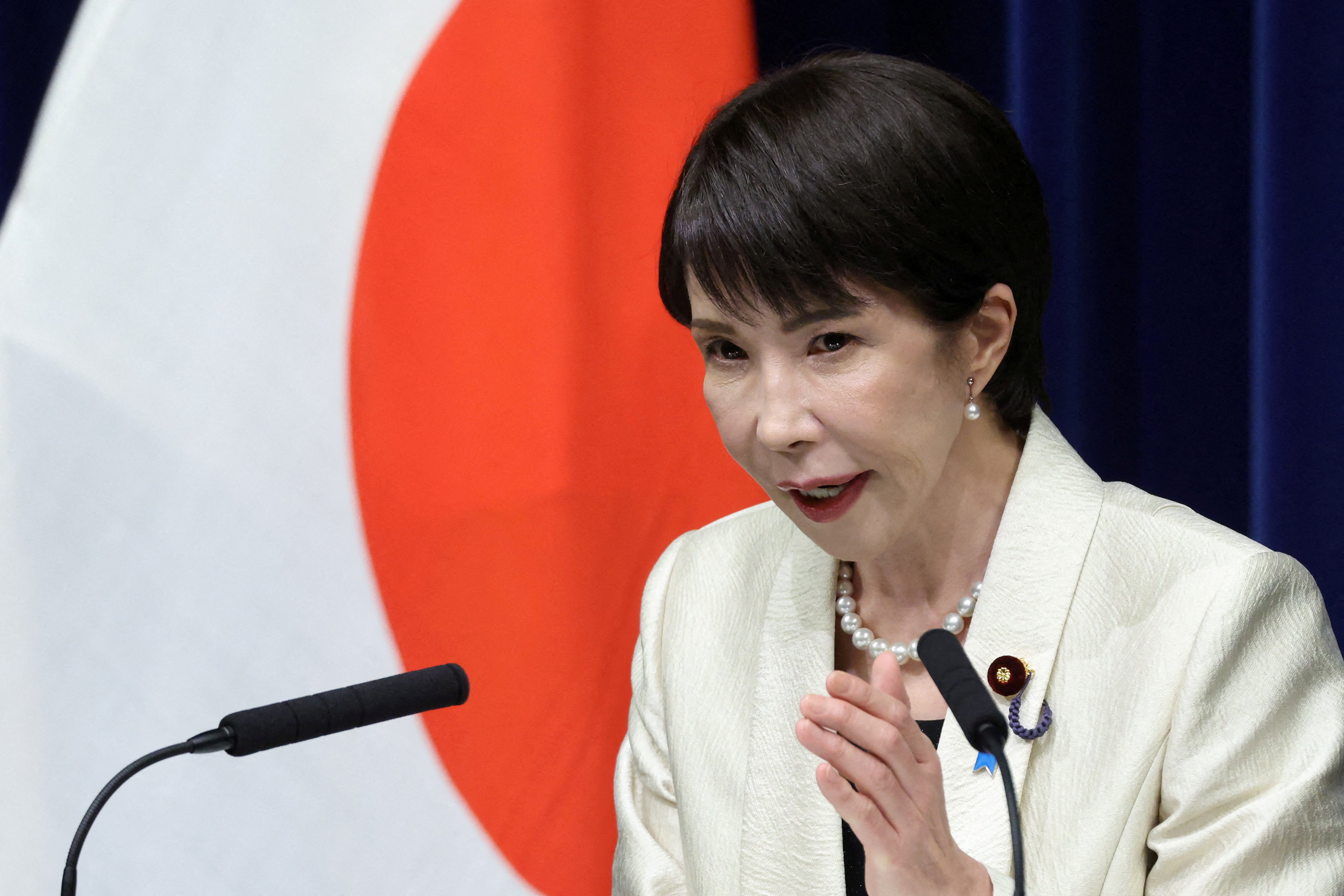 FILE PHOTO: Japanese PM Takaichi attends press conference after being reelected by parliament, in Tokyo