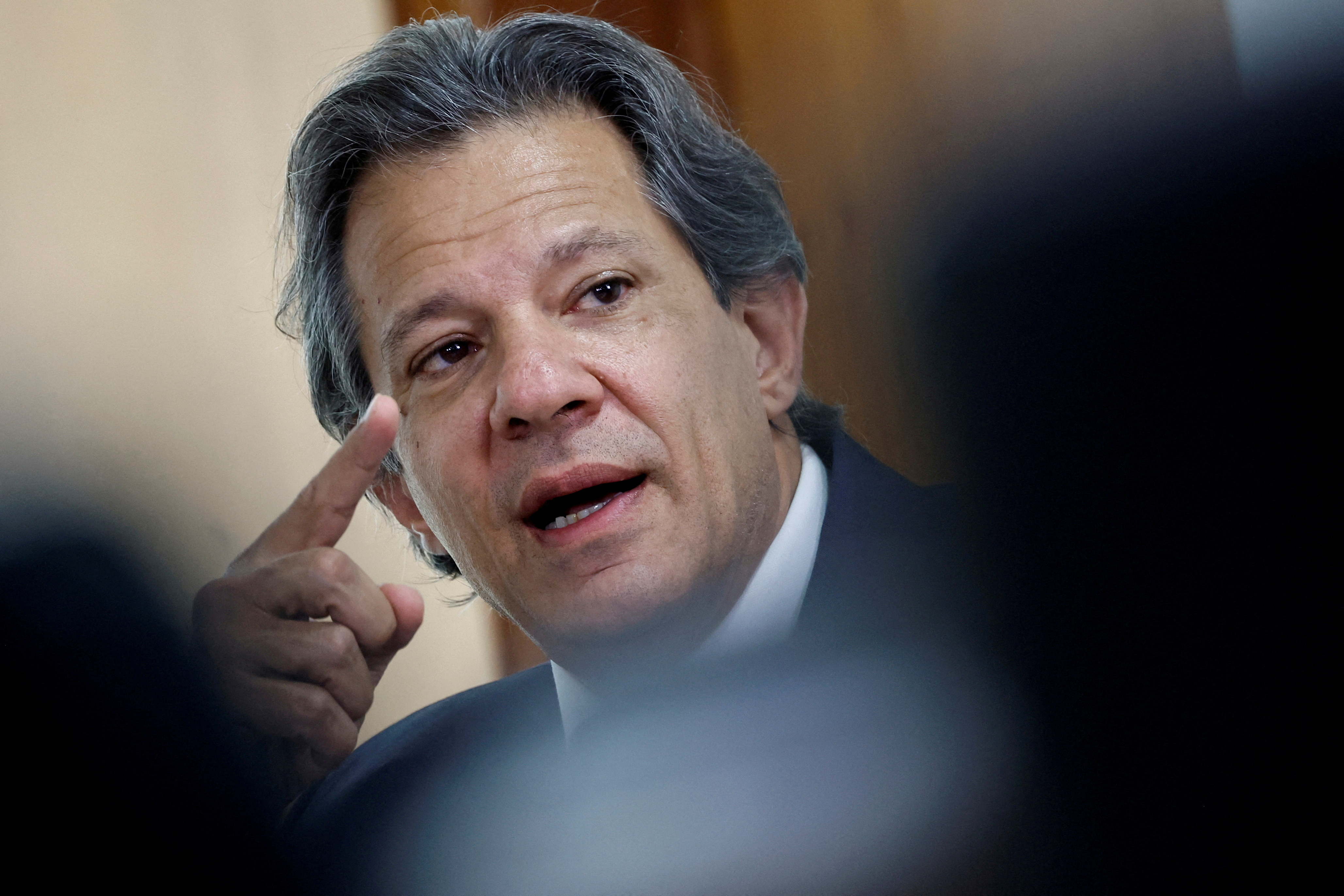 FILE PHOTO: Brazil's Finance Minister Fernando Haddad attends a meeting with Brazil's President Luiz Inacio Lula da Silva to discuss online bets, at the Planalto Palace in Brasilia
