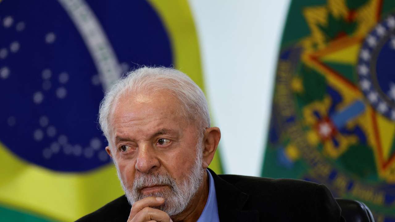 Brazil’s President Luiz Inacio Lula da Silva reacts during a meeting with members of the automotive sector in Brasilia