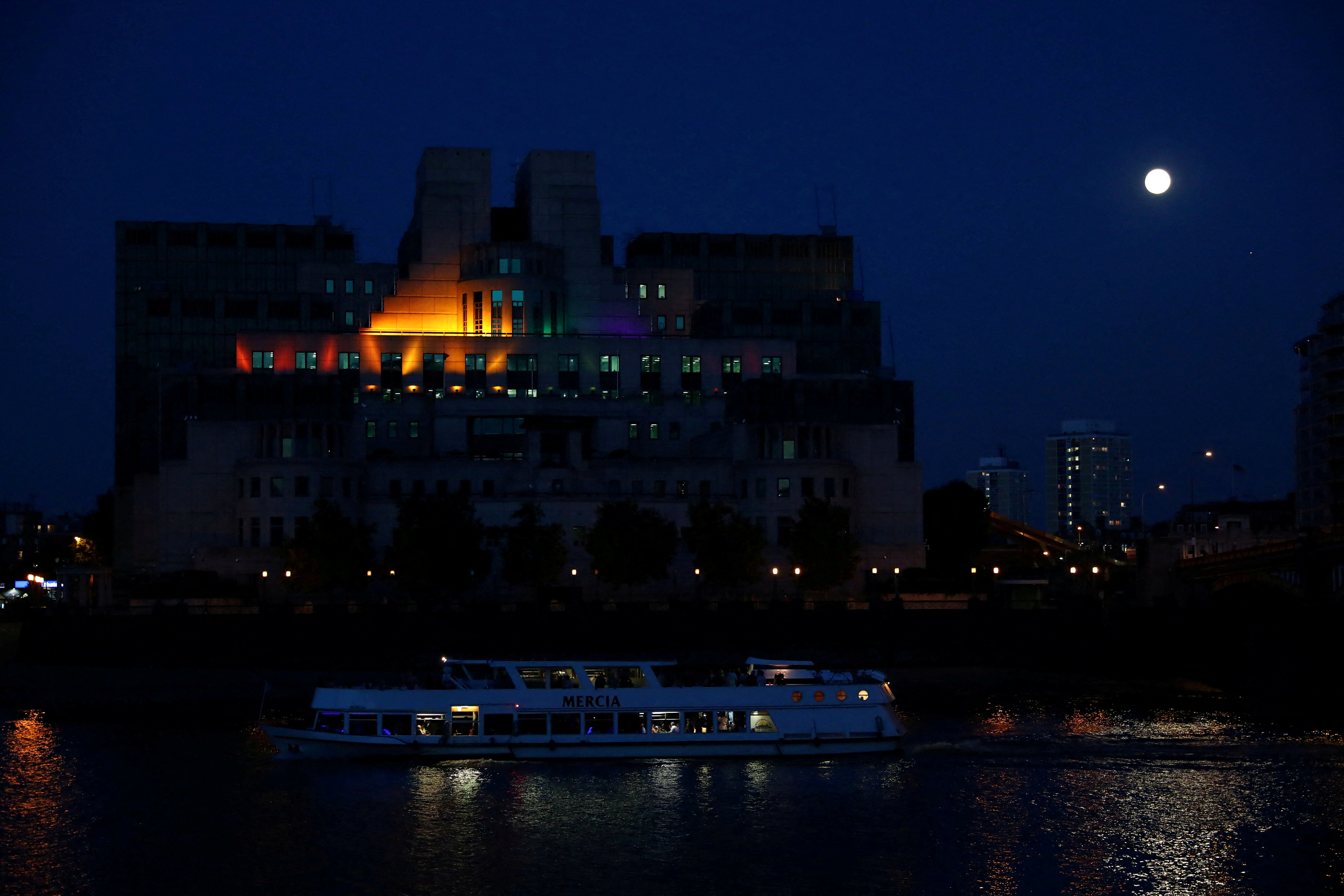 The MI6 building is illuminated to mark the  Pride in London Parade in London