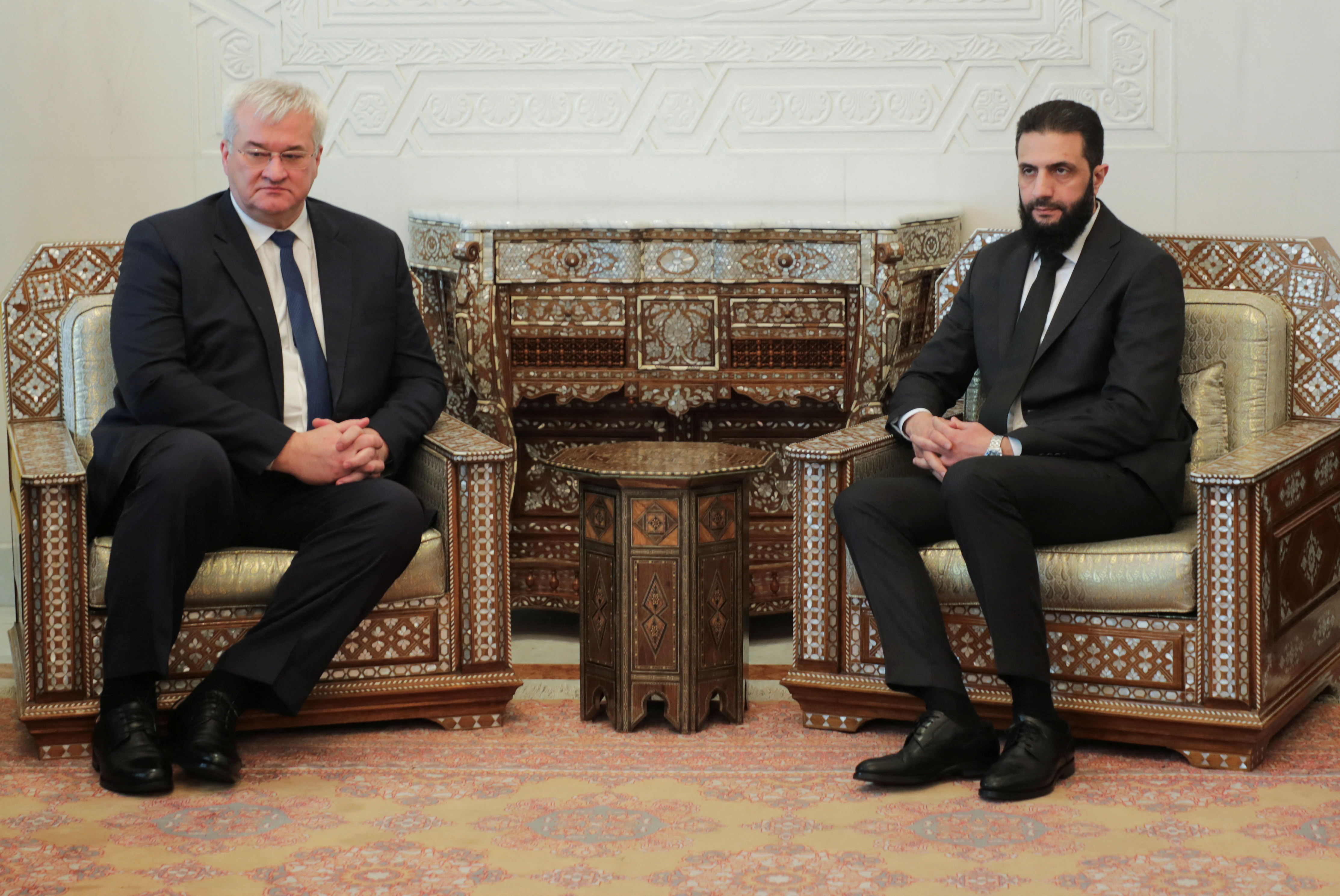 Syria's de facto leader Ahmed al-Sharaa, also known as Abu Mohammed al-Golani meets with senior Ukrainian delegation led by Ukrainian Foreign Minister Andrii Sybiha, after the ousting of Syria's Bashar al-Assad, in Damascus