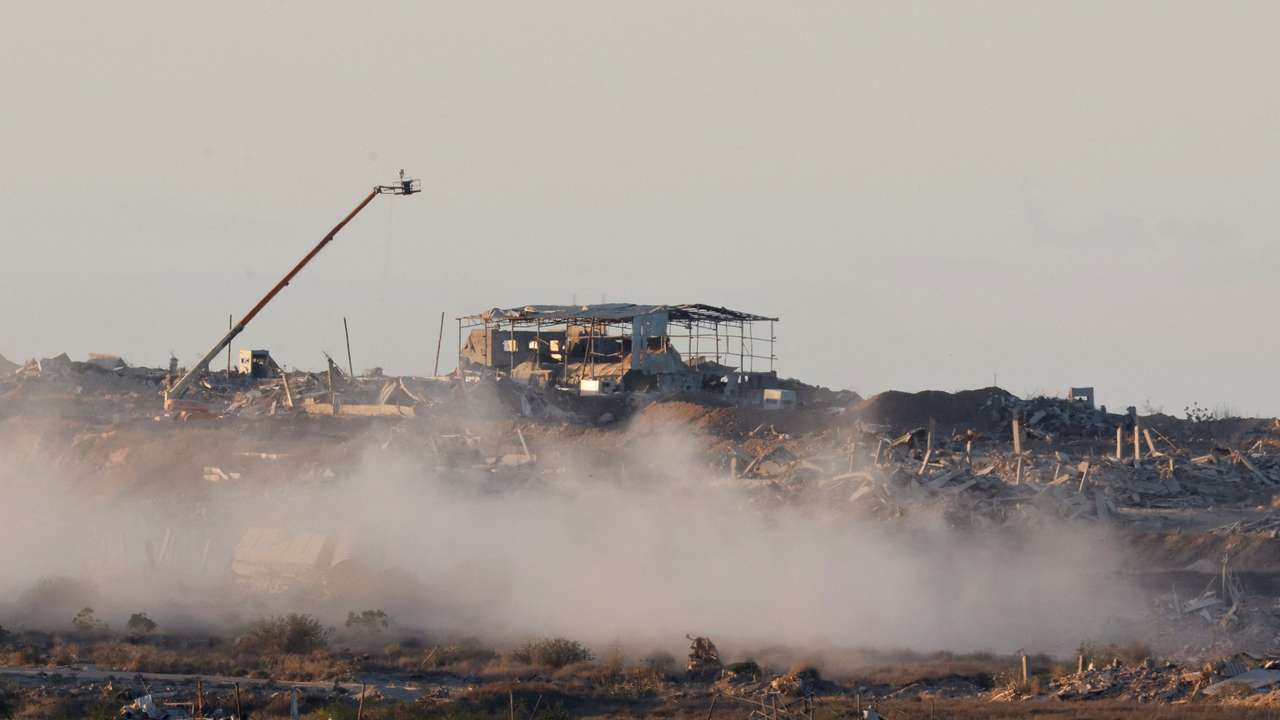 Destroyed buildings following explosions in Gaza, as seen from southern Israel