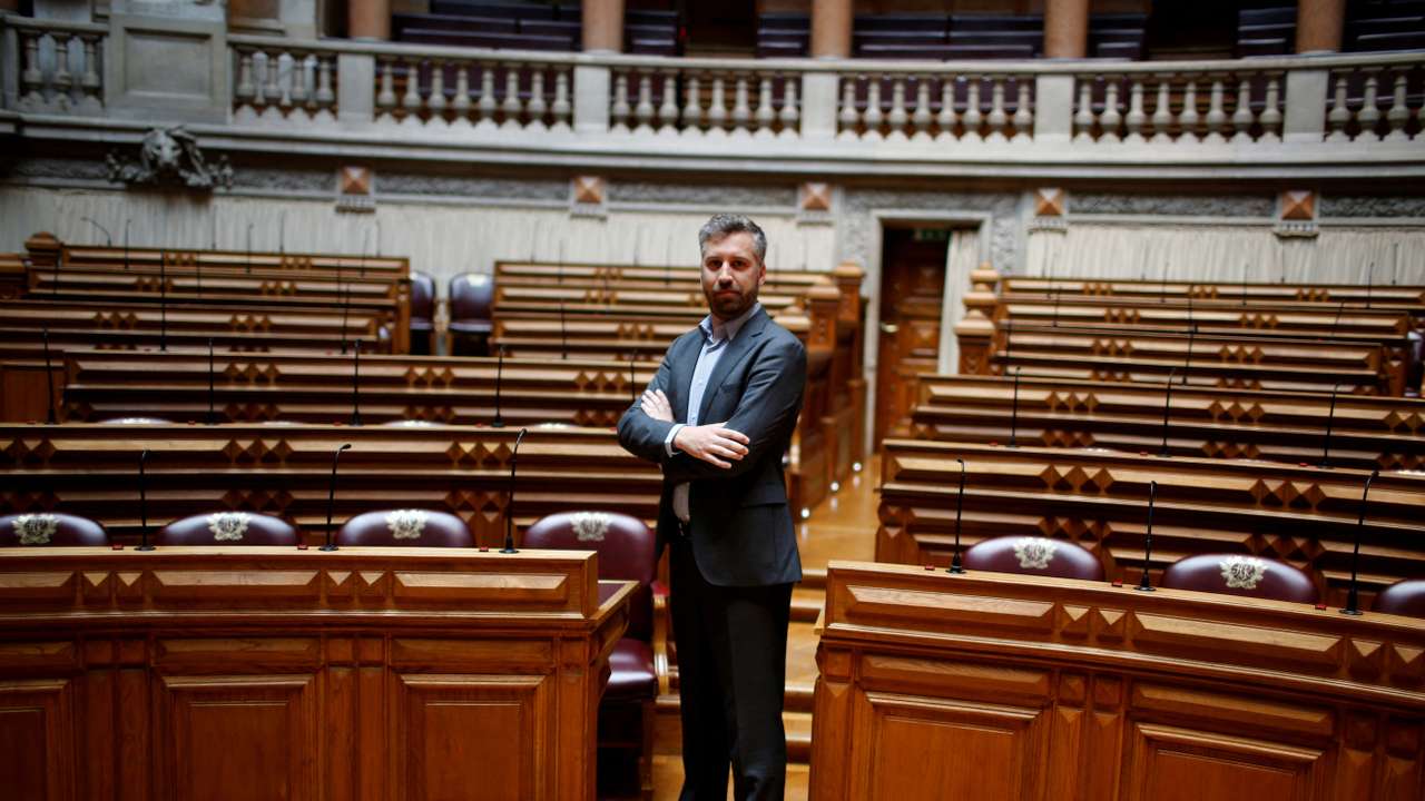 FILE PHOTO: Pedro Nuno Santos poses for a portrait between the legislators of Socialist party and left bloc inside Portuguese parliament in Lisbon
