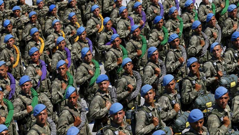 FILE PHOTO: Turkish soldiers march during a parade marking the 93rd anniversary of Victory Day in Ankara