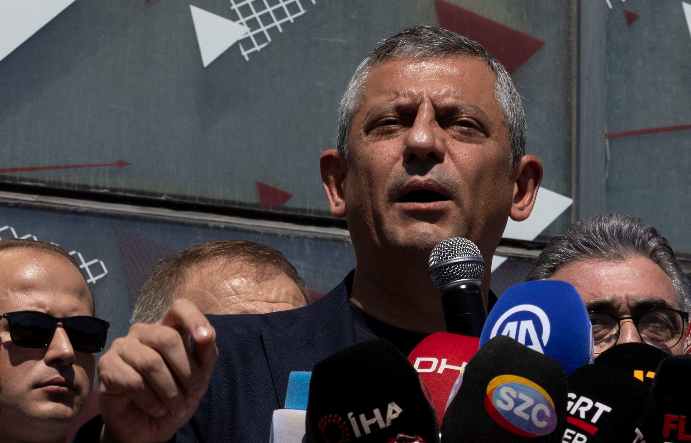 Main opposition Republican People’s Party leader Ozgur Ozel speaks in front of his party's Istanbul office