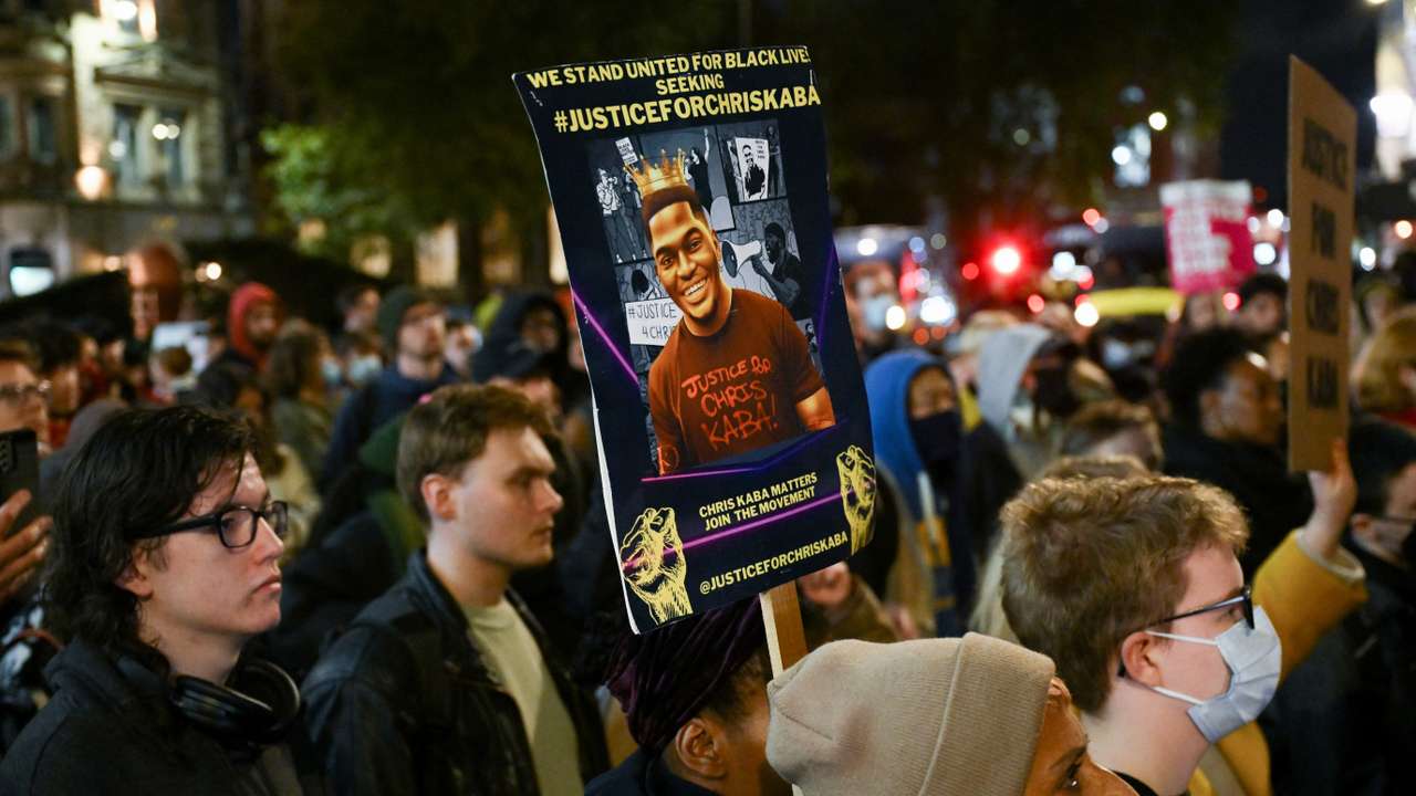 People gather outside Old Bailey after police officer was acquitted of 2022 murder of Chris Kaba, in London