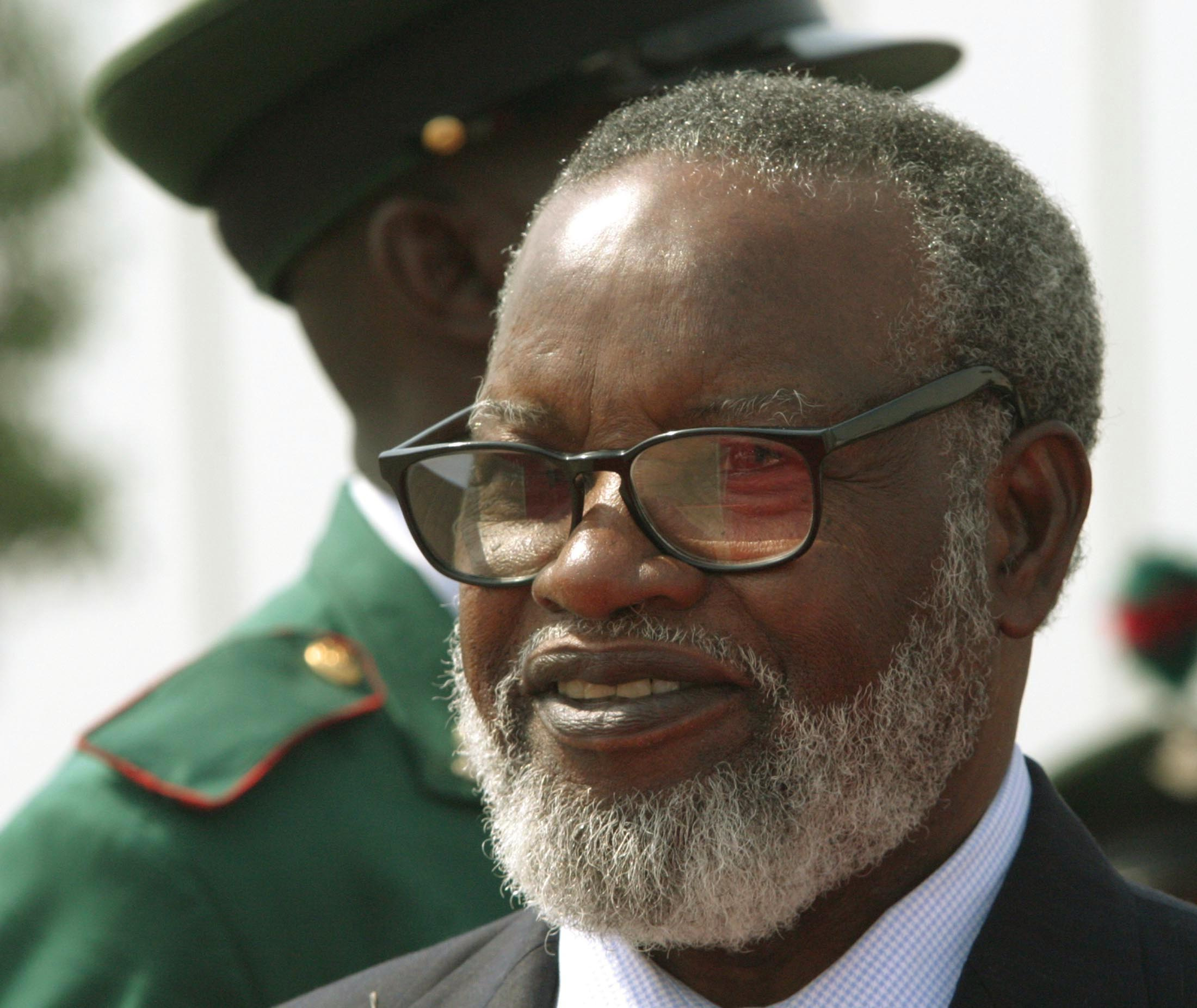 Namibian President Sam Nujoma arrives at the airport in Abuja, Nigeria.