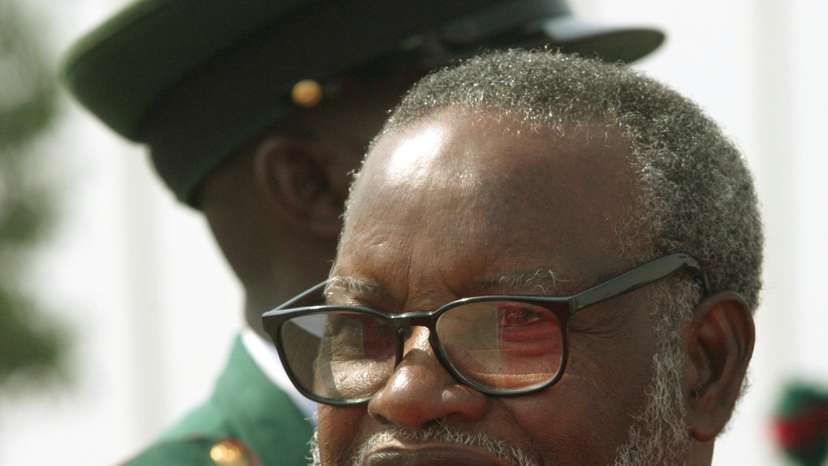 Namibian President Sam Nujoma arrives at the airport in Abuja, Nigeria.