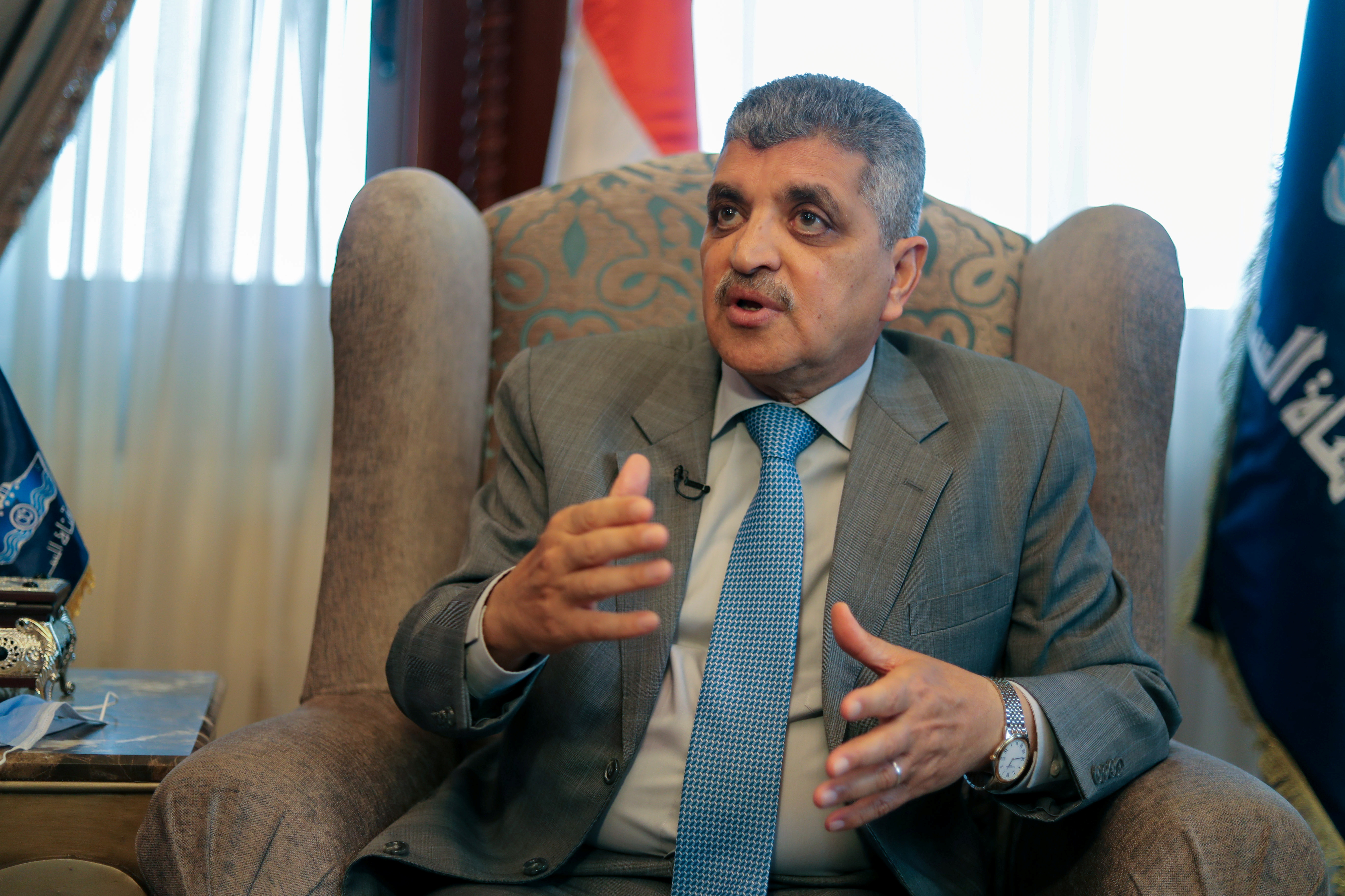 Osama Rabie, Chairman of the Suez Canal Authority, speaks during an interview with Reuters in his office in the city of Ismailia