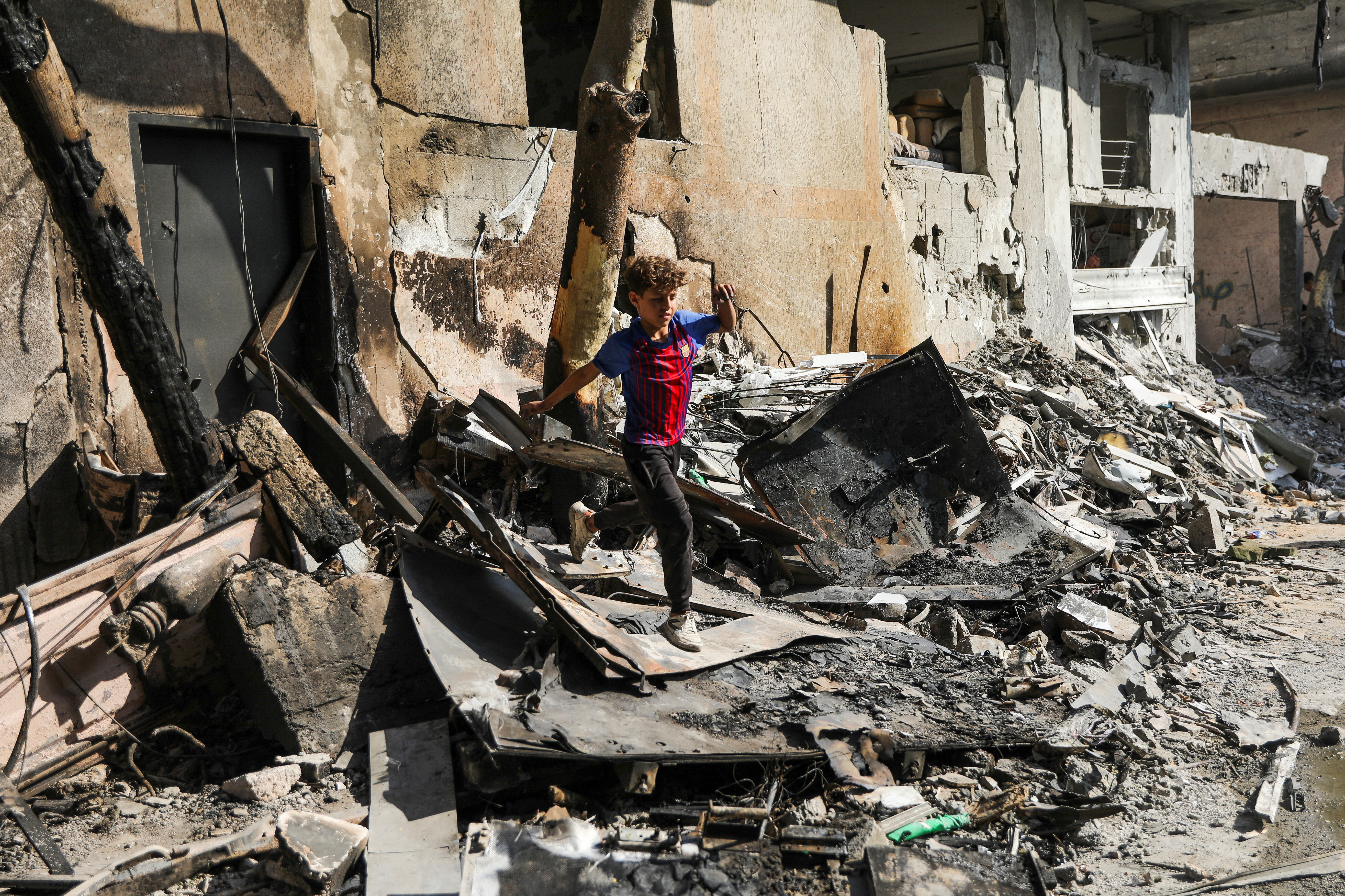 Aftermath of Israeli strikes at the area where Israeli hostages were rescued on Saturday, in Nuseirat refugee camp