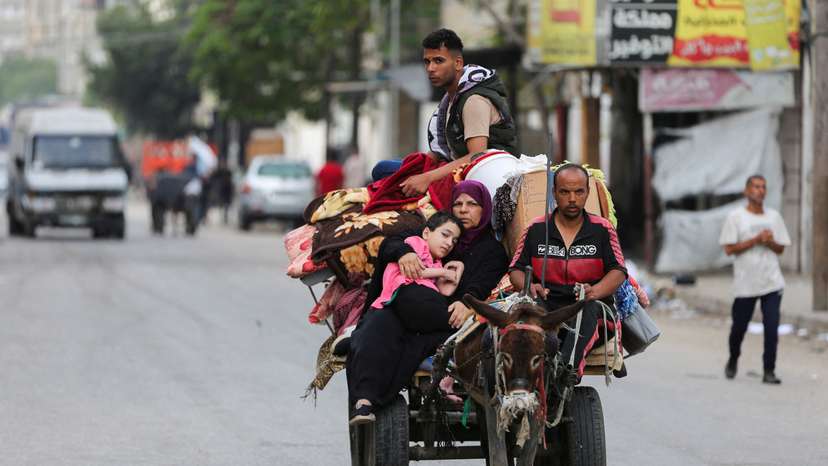 Palestinians flee Rafah due to an Israeli military operation, in Rafah, in the southern Gaza Strip