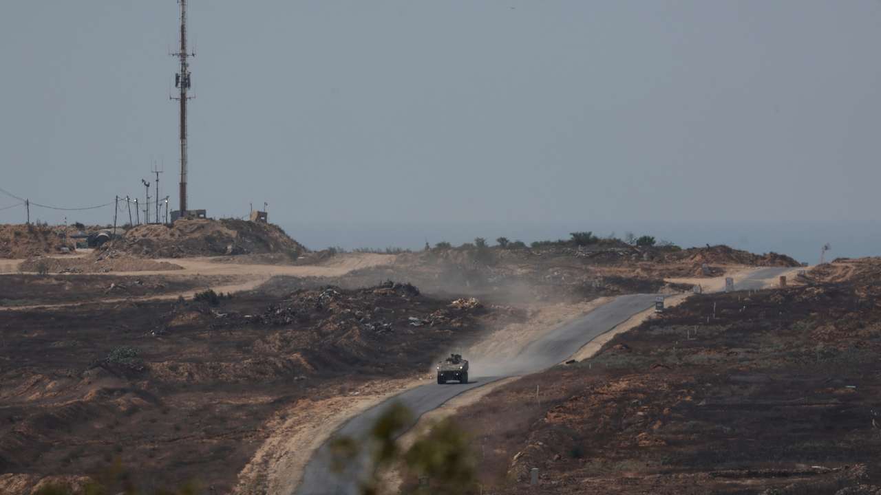 Israeli military vehicle manoeuvres inside the Gaza strip, as seen from Israel
