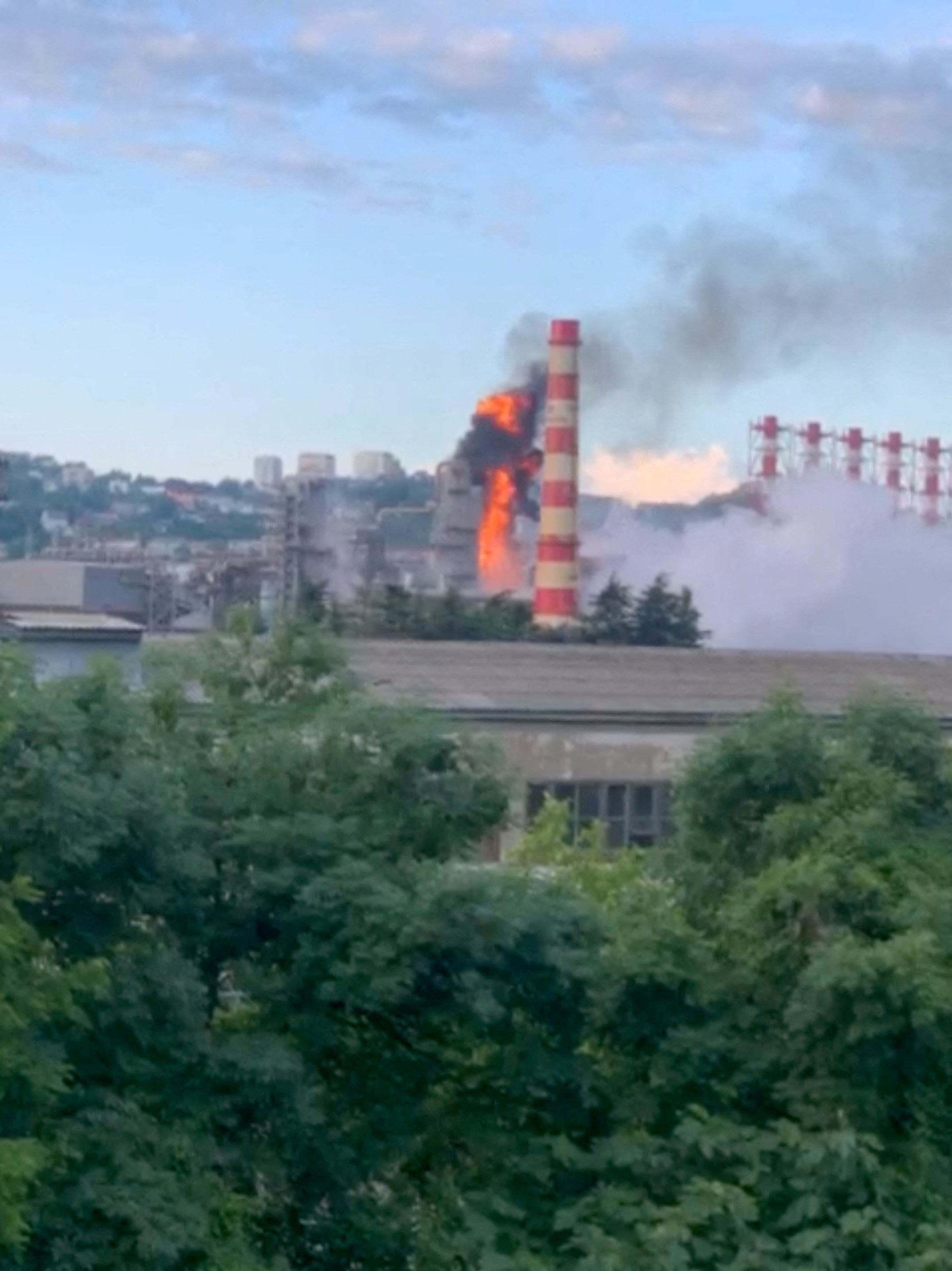 FILE PHOTO: Smoke and fire rise from a refinery after a drone attack in Tuapse