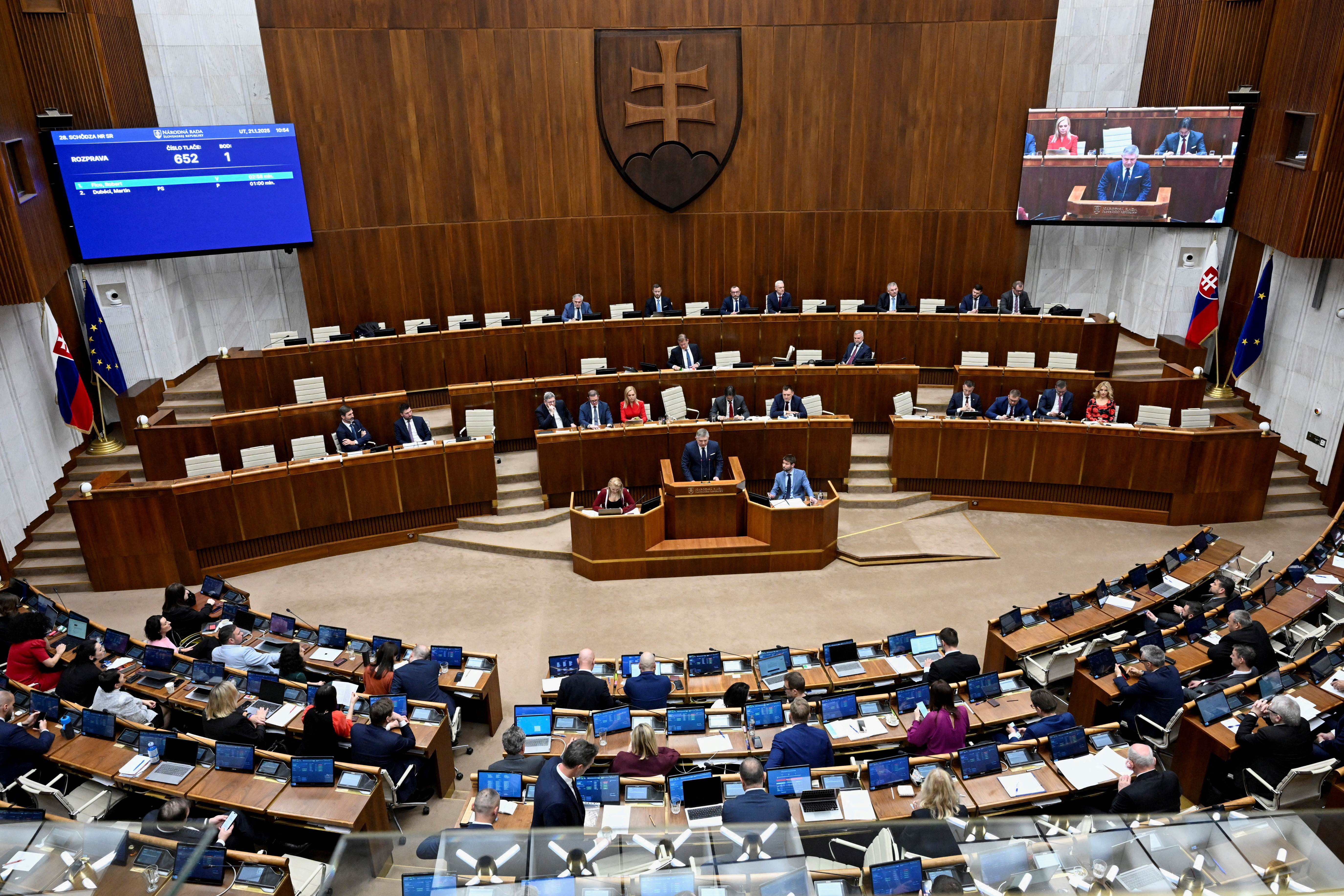 FILE PHOTO: Slovakia's PM Fico attends a parliamentary session during a no-confidence vote against his government