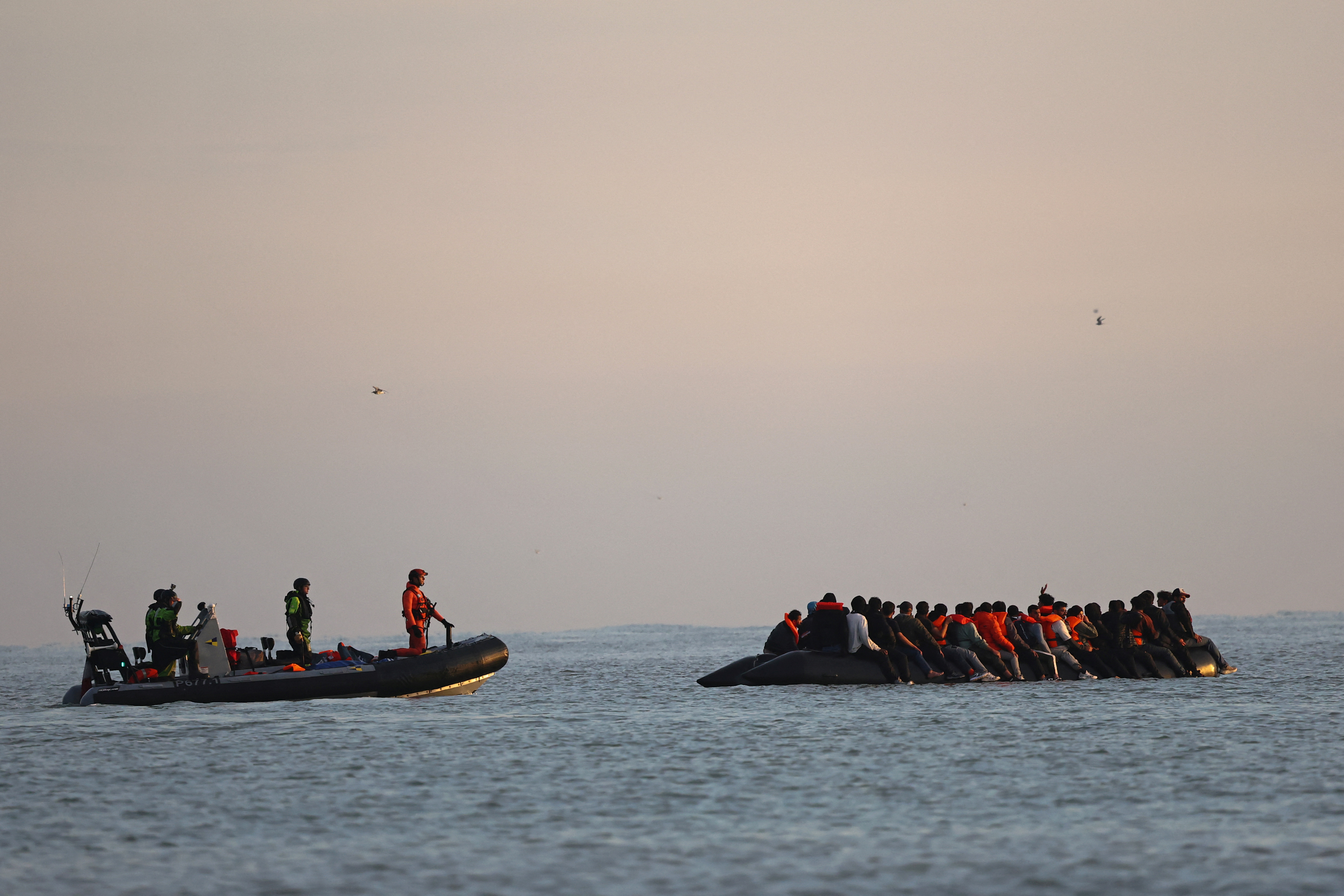 FILE PHOTO: Migrants leave French coast in dinghies as UK, France tighten asylum rules