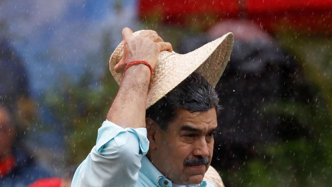 FILE PHOTO: Government supporters march to commemorate the Battle of Santa Ines, in Caracas