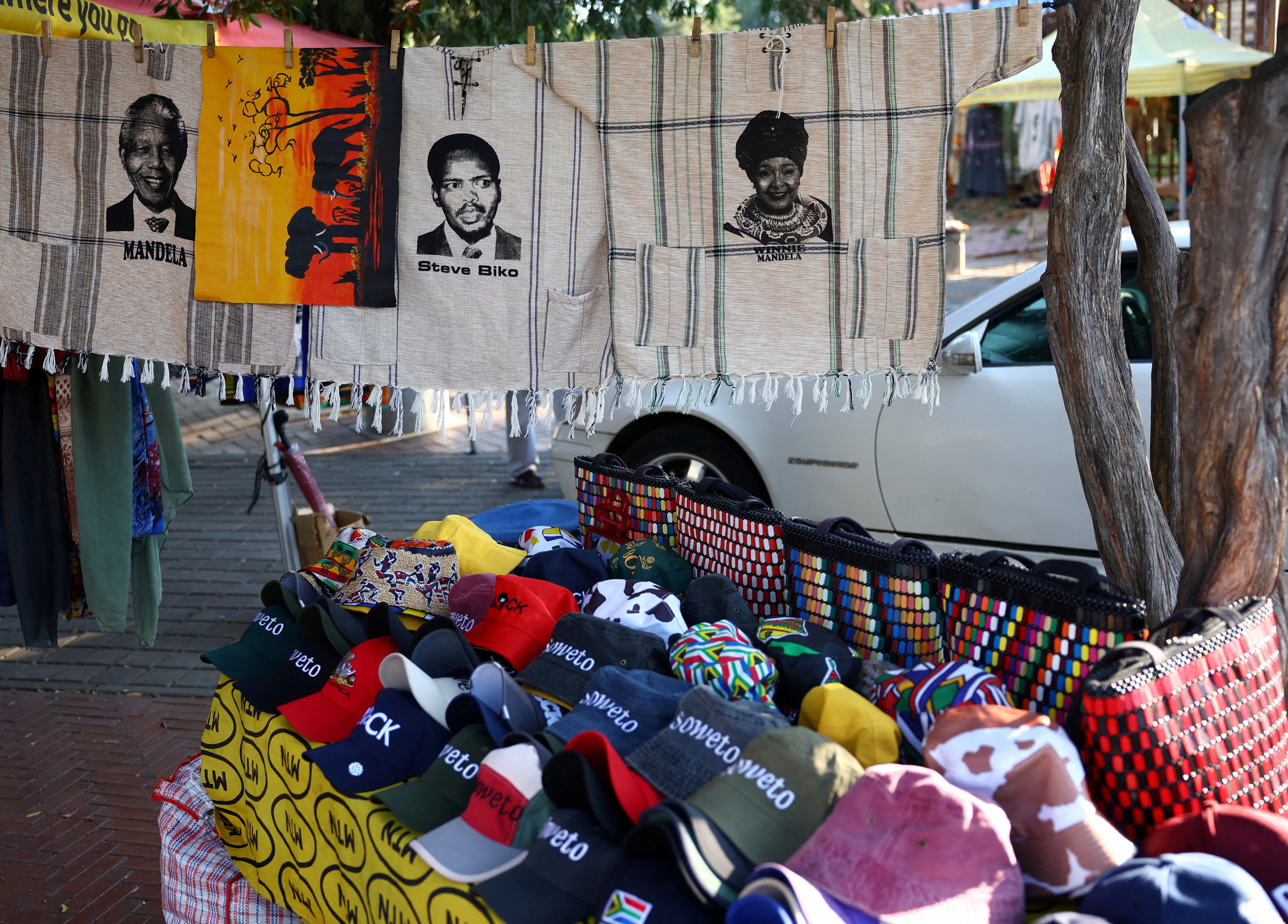 FILE PHOTO: Souvenirs with faces of the late anti-apartheid activists and politicians of South Africa