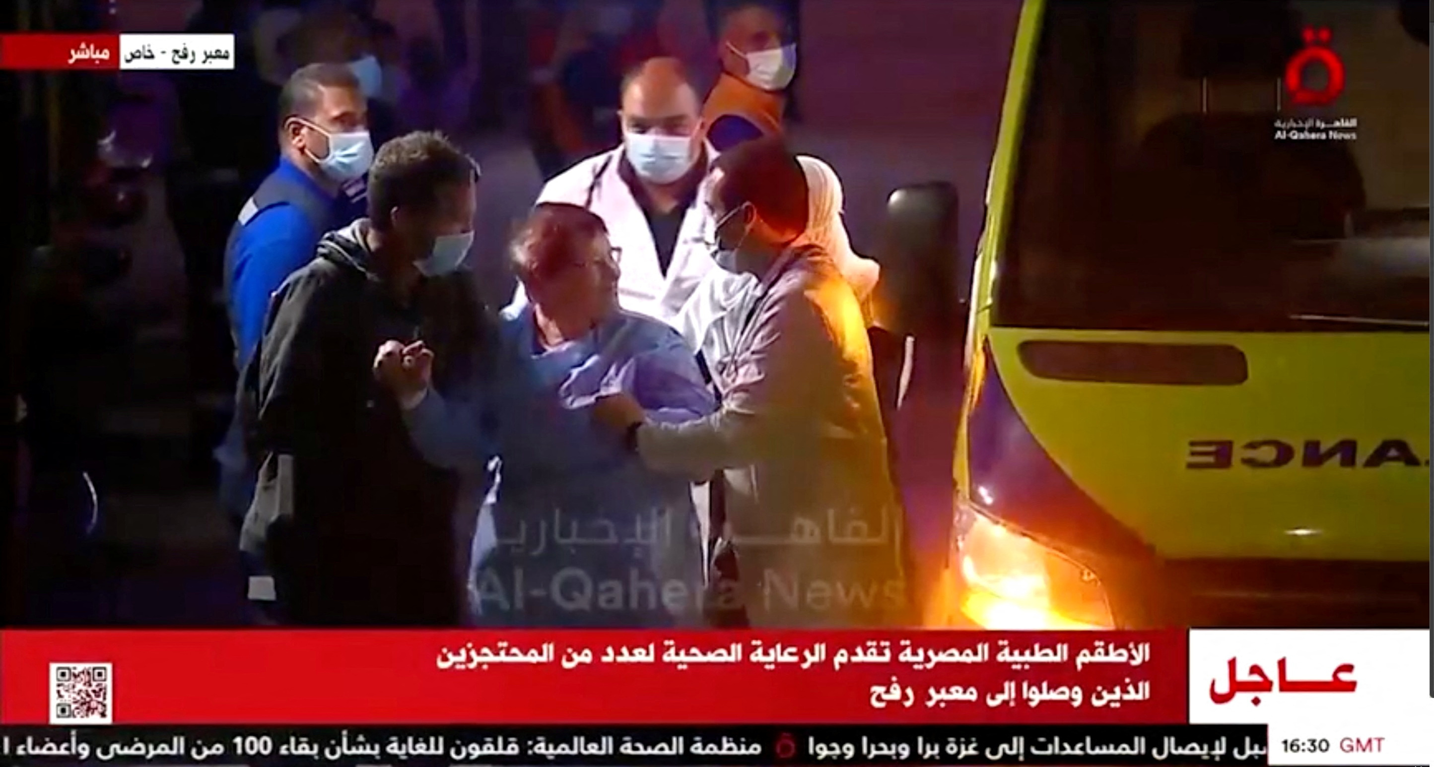 A convoy of vehicles carrying hostages abducted by Hamas militants during the October 7 attack on Israel arrives through the border crossing with Gaza