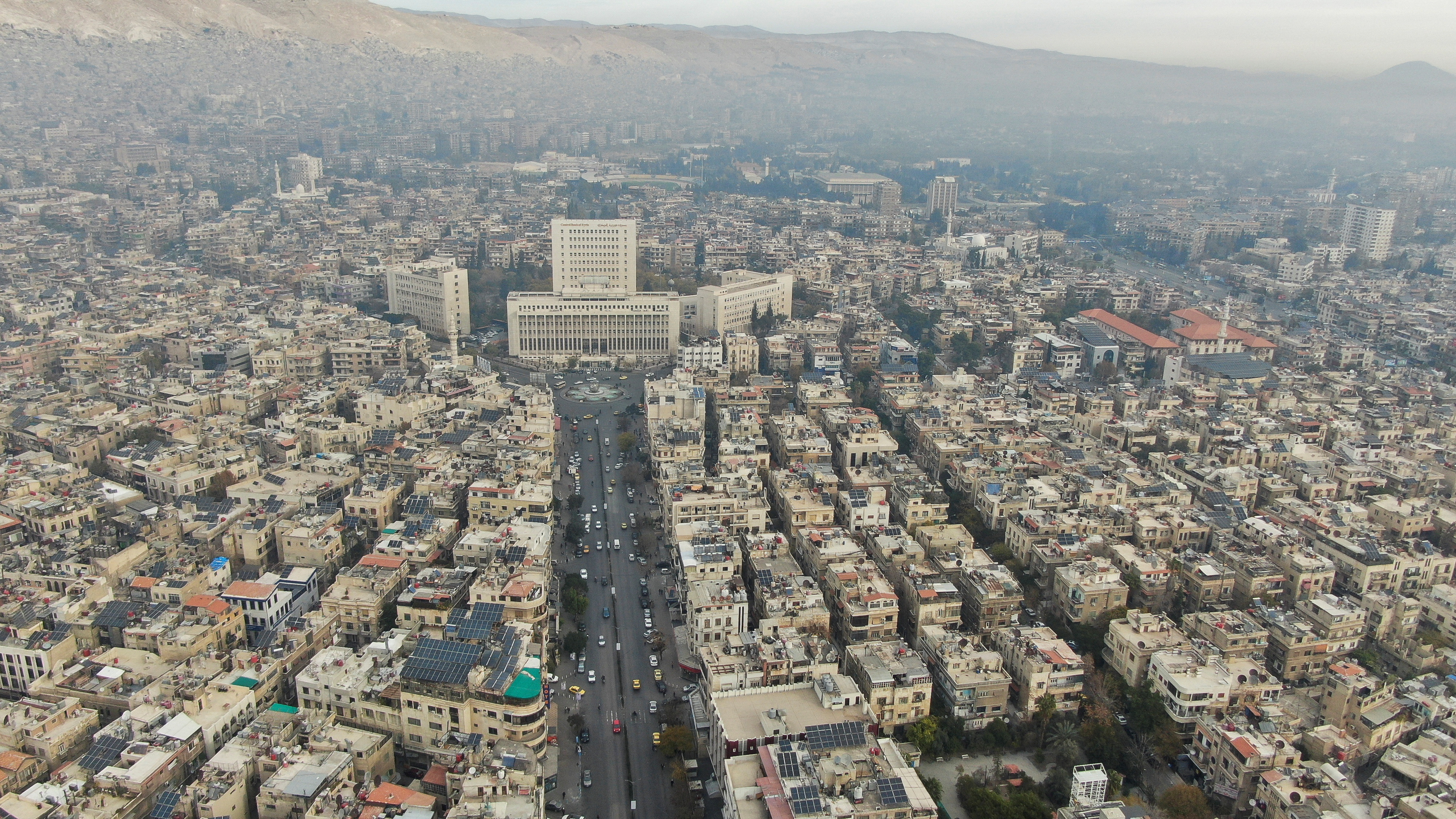 A drone view shows buildings in Damascus