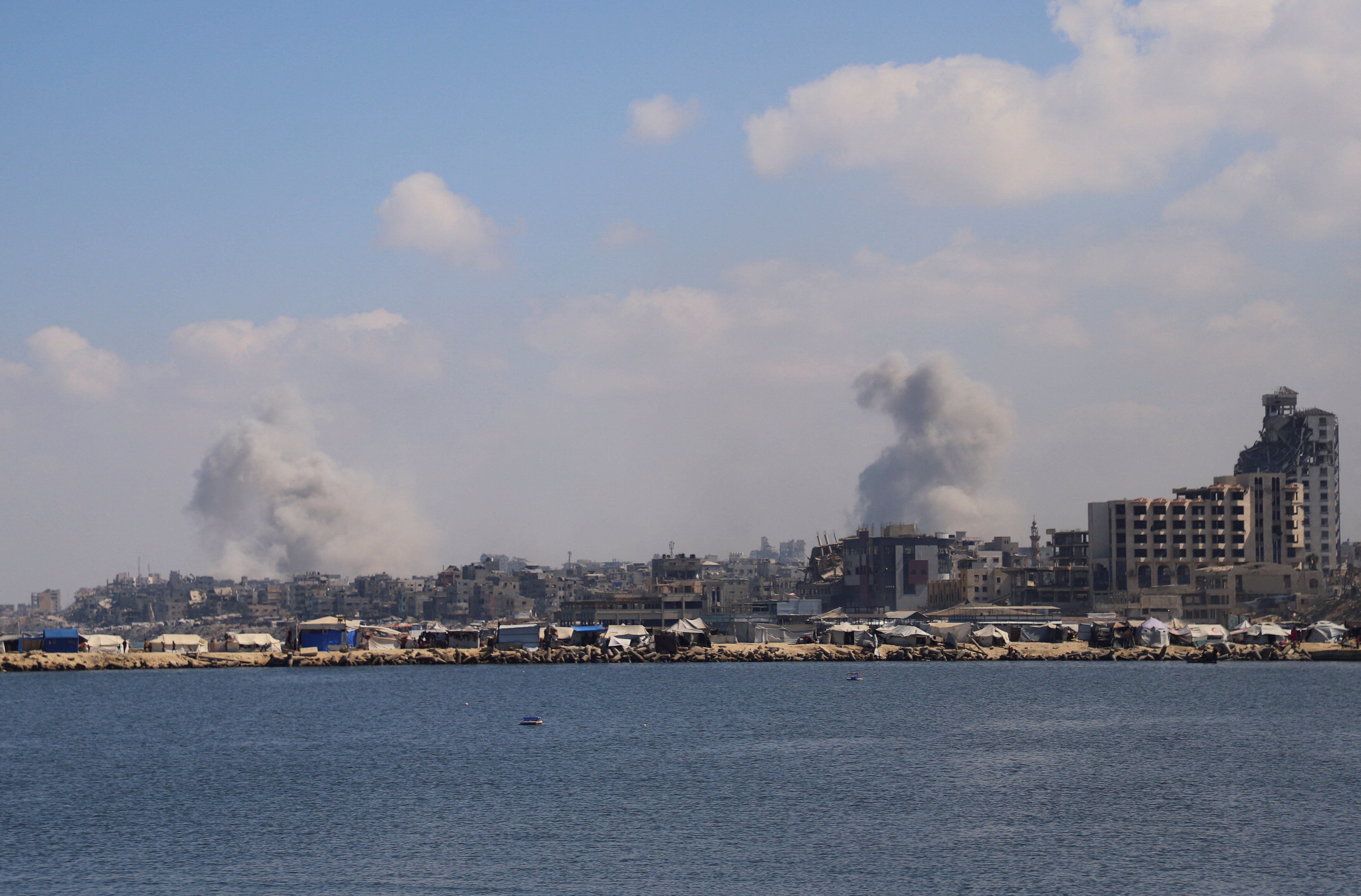 Smoke rises following Israeli strikes during a military operation, in Gaza City