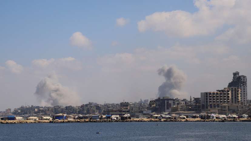 Smoke rises following Israeli strikes during a military operation, in Gaza City