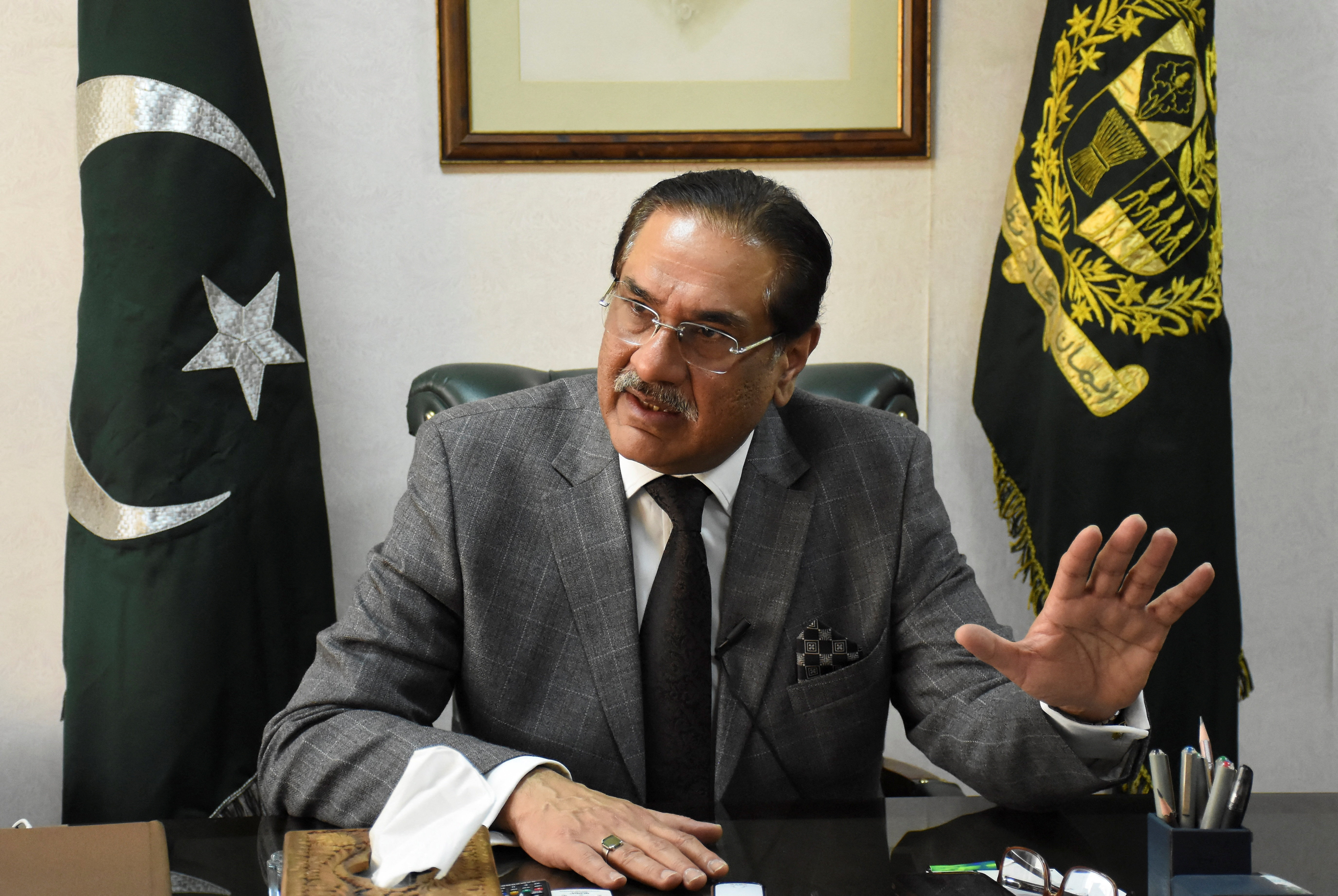 Minister for Defence Production Muhammad Raza Hayat Harraj speaks during an interview with Reuters in Islamabad