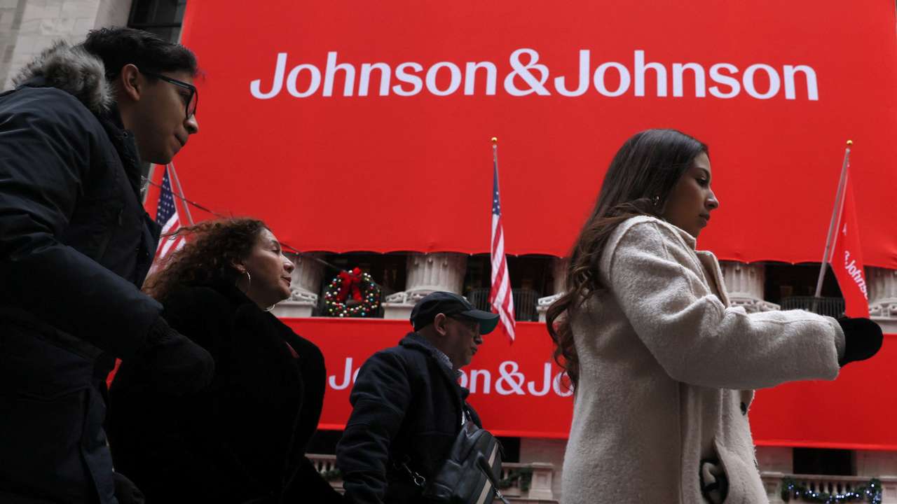 A Johnson & Johnson banner is displayed on the front of the NYSE in New York