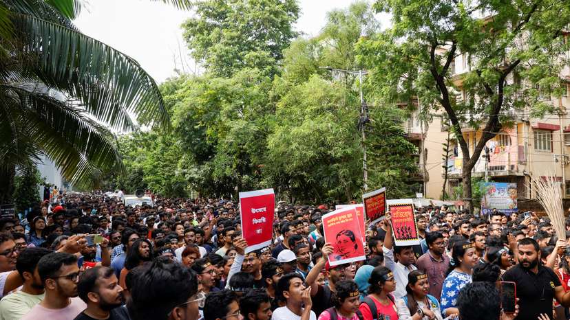 Medics march along a street during a protest condemning the rape and murder of a trainee medic at a government-run hospital, in Kolkata