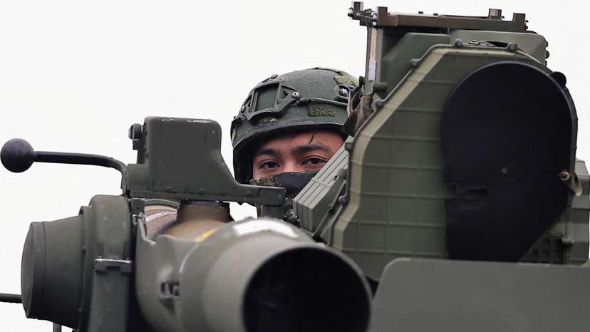 FILE PHOTO: A soldier stands on an M1167 TOW carrier vehicle at the Fangshan training grounds in Pingtung