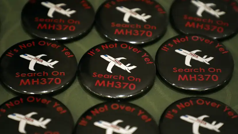 Badges are displayed during the sixth annual remembrance event for the missing Malaysia Airlines flight MH370 in Putrajaya