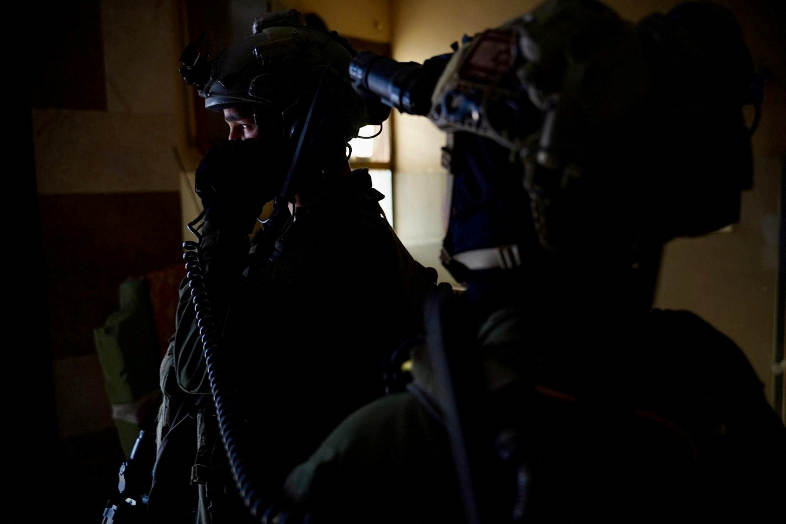 Israeli soldiers operate in a location given as Nasser Hospital in Gaza