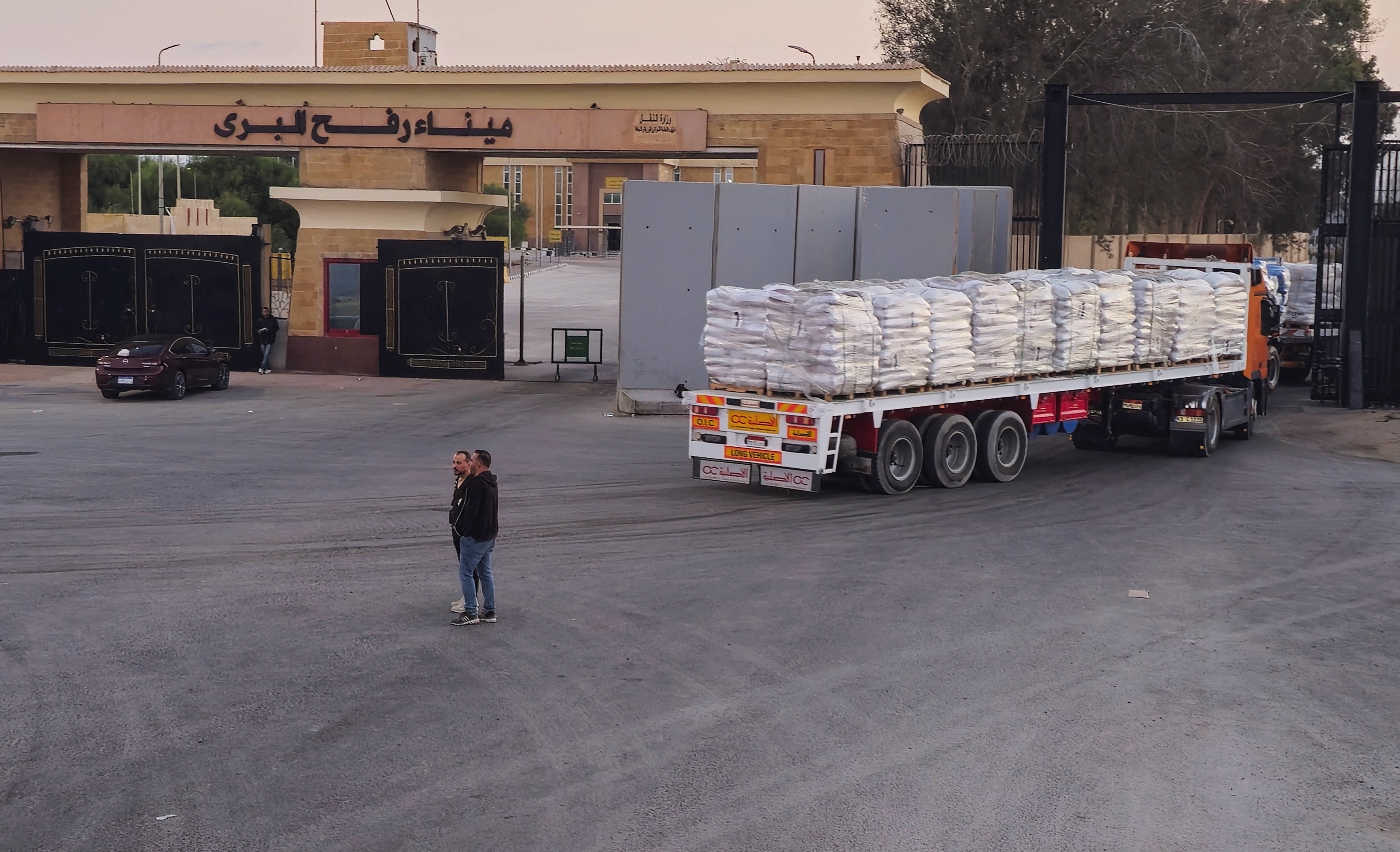 Trucks carrying humanitarian aid and fuel at the Rafah border on the Egypt side