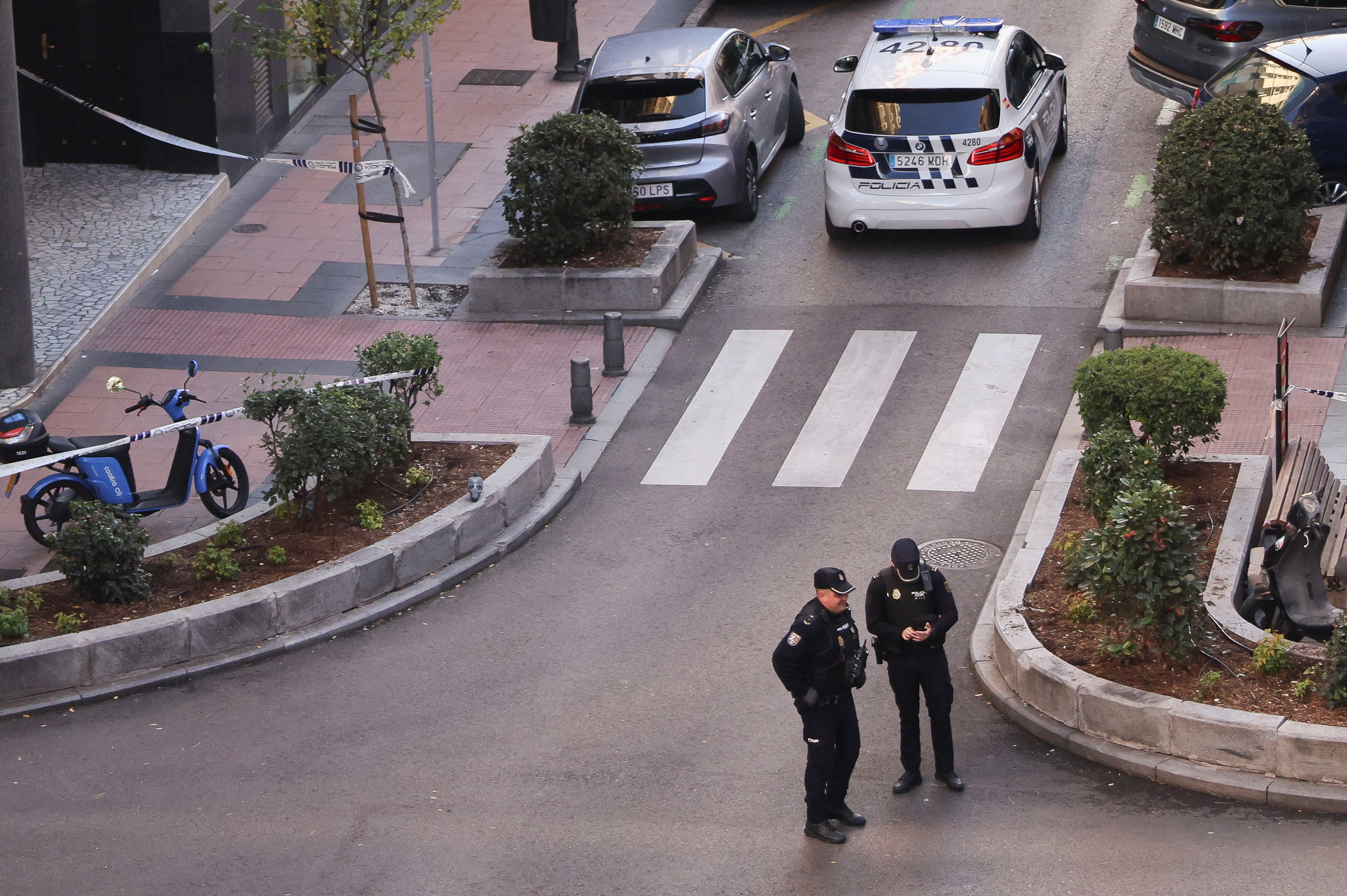 Police work at the site where Alejo Vidal-Quadras, former head of Spain's People's Party in the Catalonia region, was shot in the face, in Madrid
