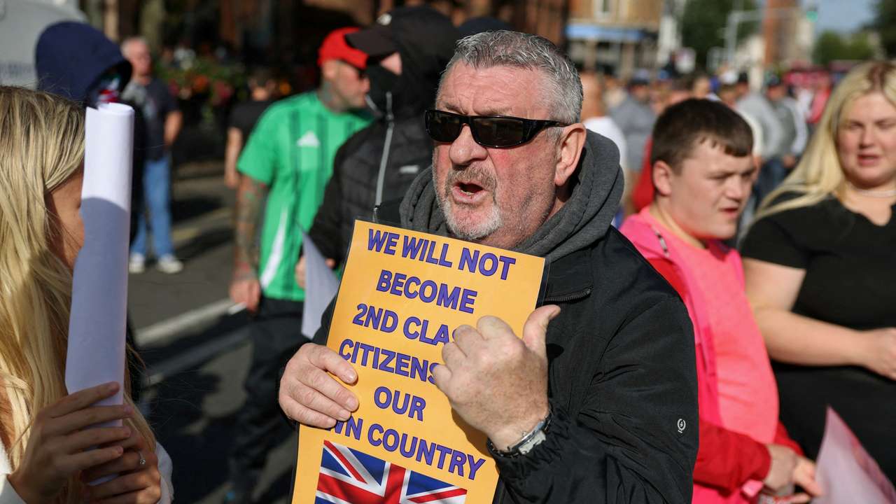 FILE PHOTO: Protesters attend an anti-immigration protest in Belfast