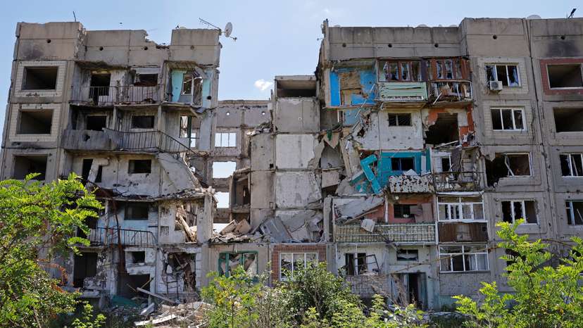 A view shows a destroyed apartment building in Toshkivka