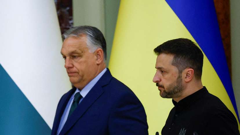 FILE PHOTO: Hungary's Prime Minister Viktor Orban and Ukrainian President Volodymyr Zelenskiy arrive for a joint news briefing in Kyiv