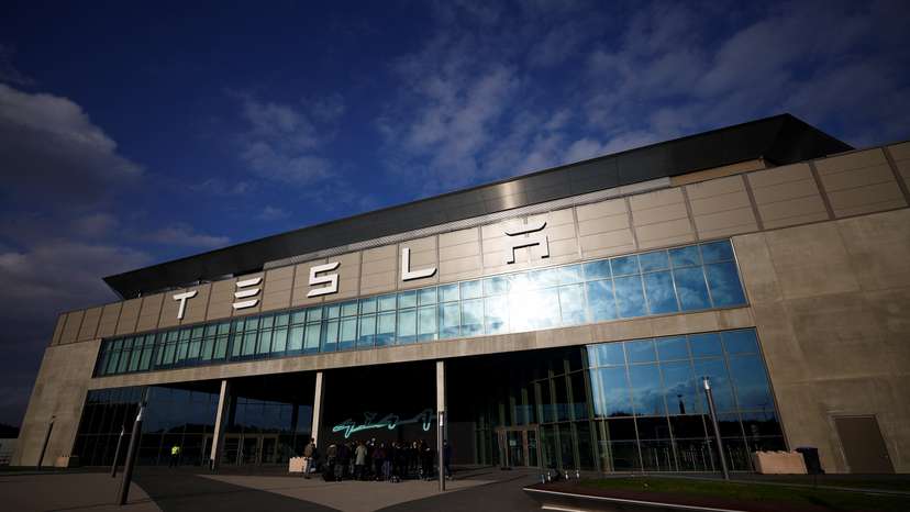 Tesla's Gigafactory halts its production after a suspected arson attack, in Gruenheide