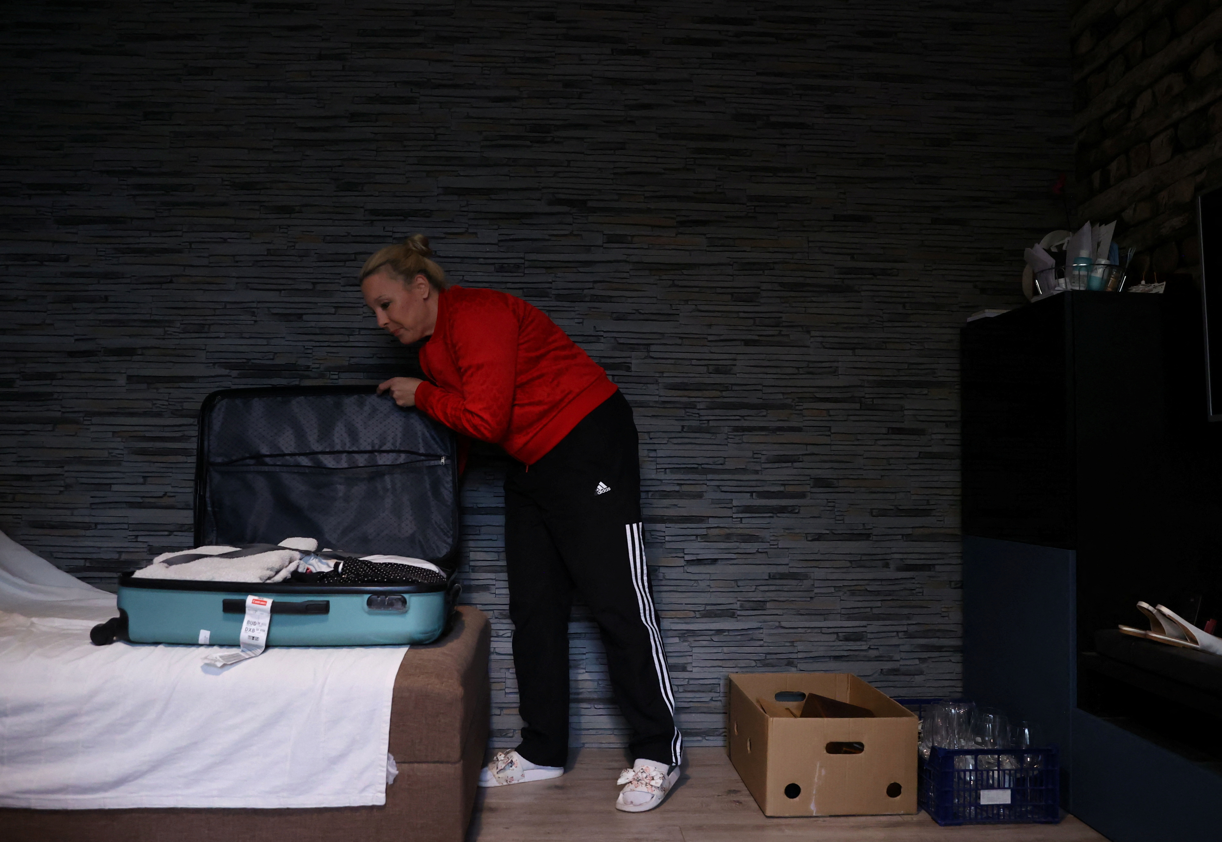 Czovek, 45, packs up her house as she moves to Austria