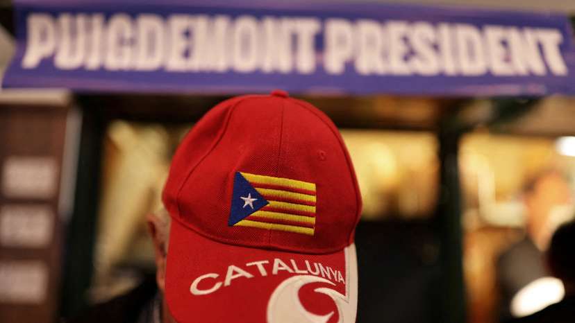 FILE PHOTO: Facing Spanish arrest warrant, Catalan politician campaigns from France