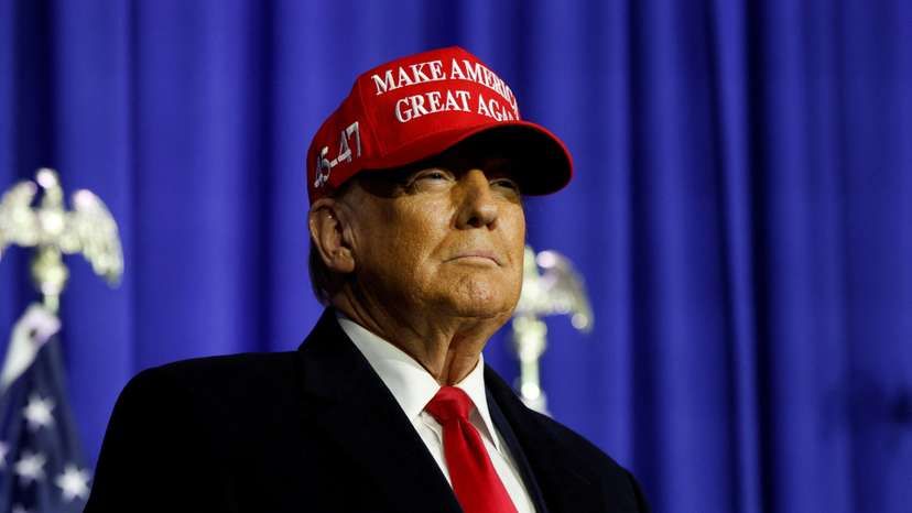Former U.S. President Donald Trump looks on at a campaign event in Waterford Township, Michigan
