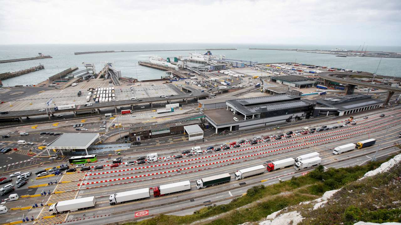 FILE PHOTO: Vehicles queue at the border control booths at the Port of Dover