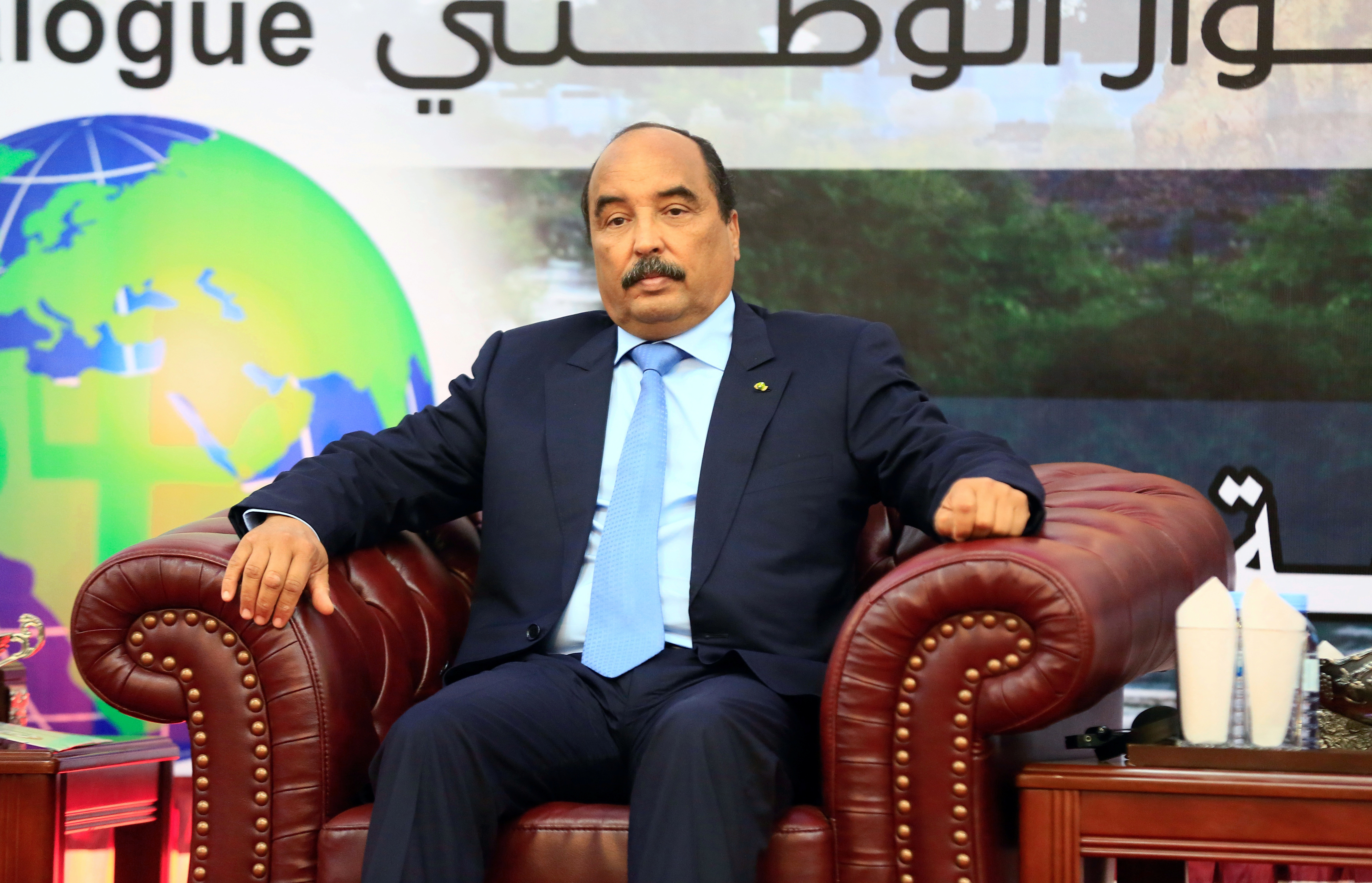 Mauritania's President Mohamed Ould Abdel Aziz attends the closing session ofÊSudan's National Dialogue at the Friendship Hall in Khartoum