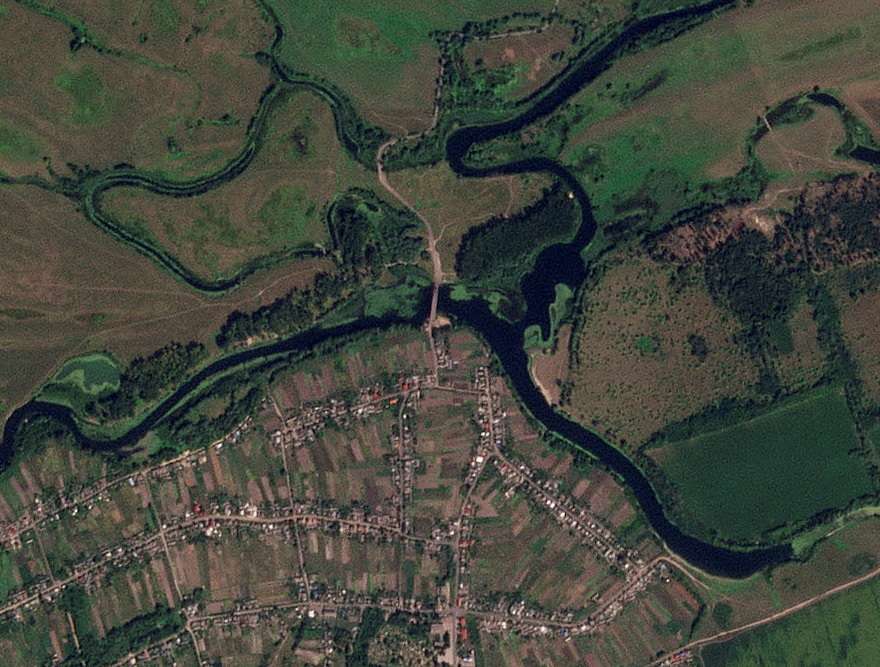 A satellite image shows a strategic bridge over the Seym River that has been destroyed, in Zvannoe