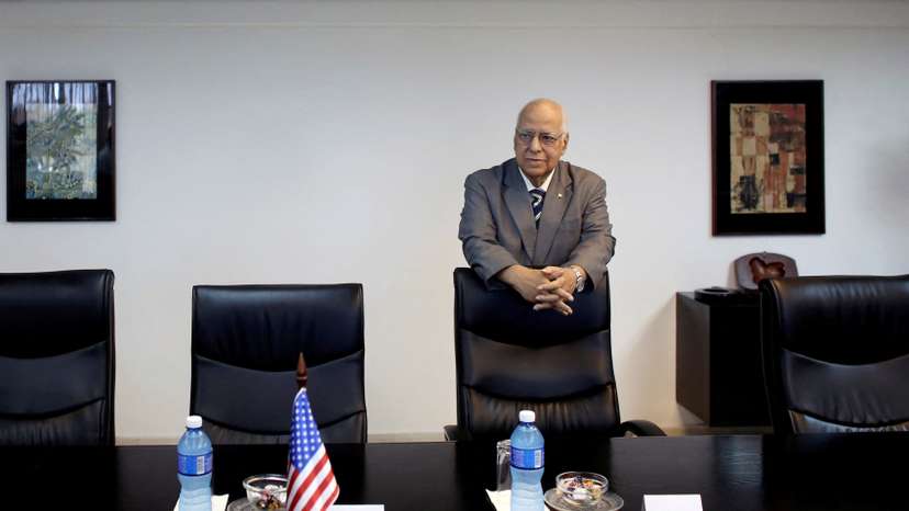 FILE PHOTO: Vice President of Cuba's Council of Ministers Ricardo Cabrisas Ruiz waits for the arrival of Missouri Governor Jay Nixon for a meeting in Havana, Cuba