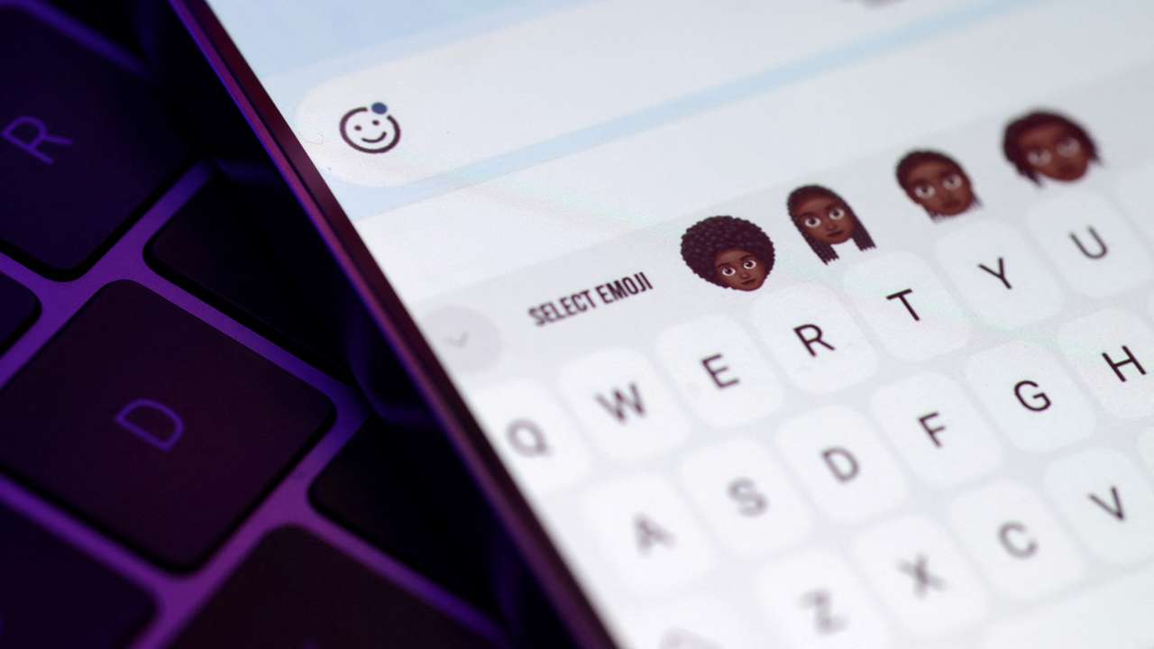 Emojis featuring cornrows, locs, braids and afro hair, drawn by Rise.365 members and digitalised by Good Relations Junior Designer, Vanita Brown are seen on smartphone
