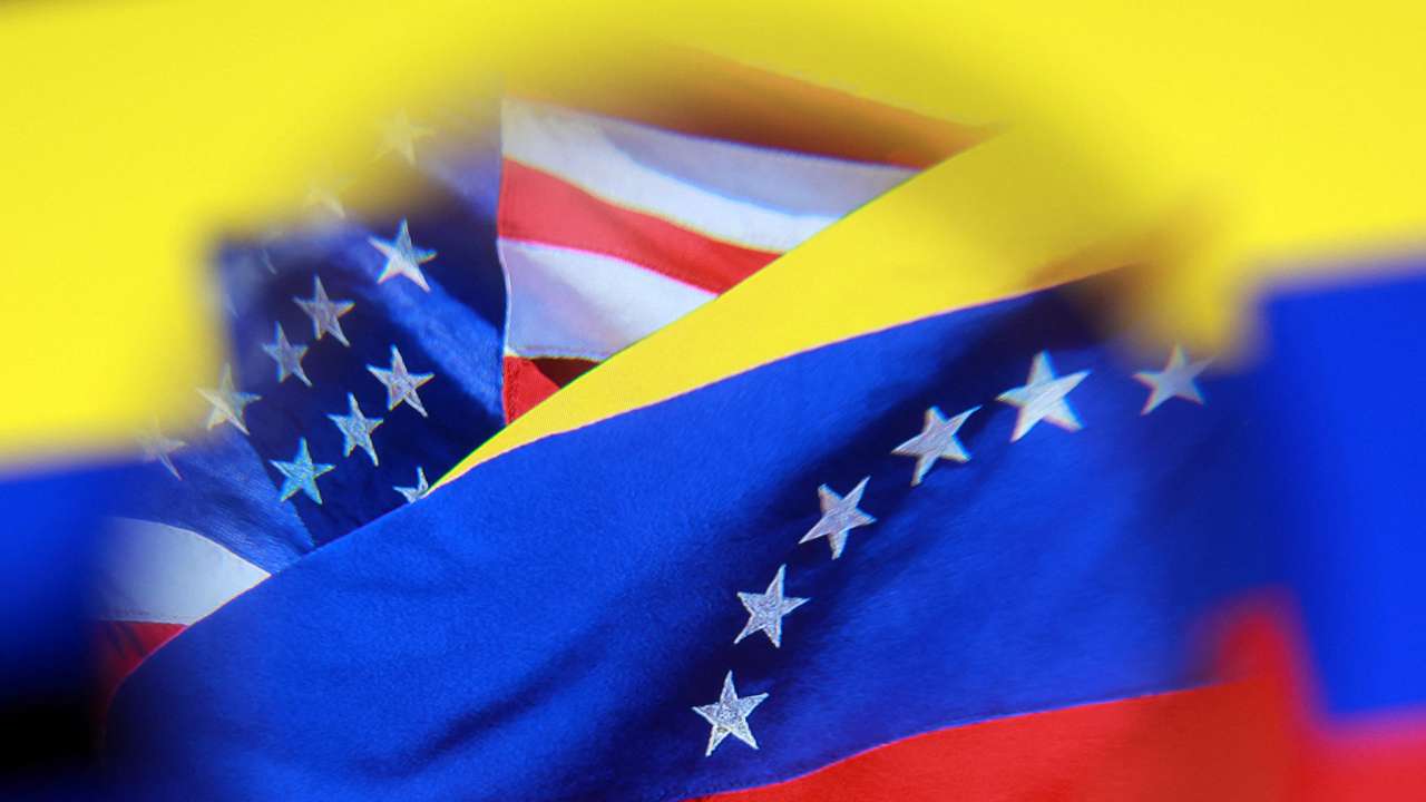 Illustration shows U.S. and Venezuelan flags
